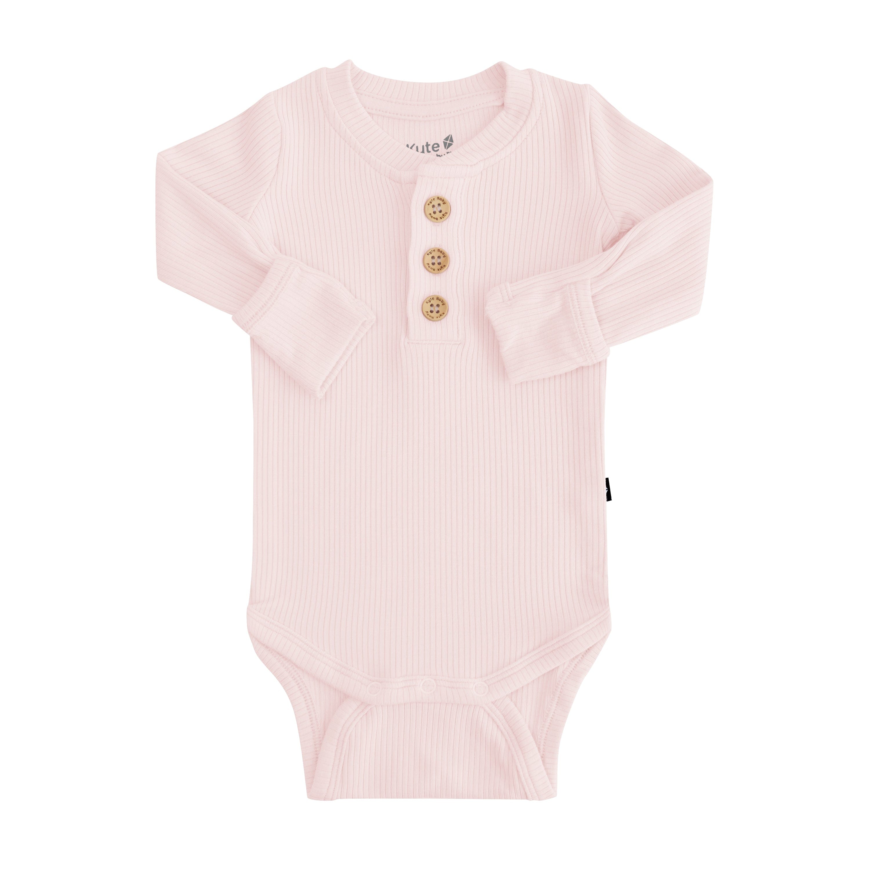 Kyte Baby Ribbed Long Sleeve Henley Bodysuit with wooden buttons in Blush