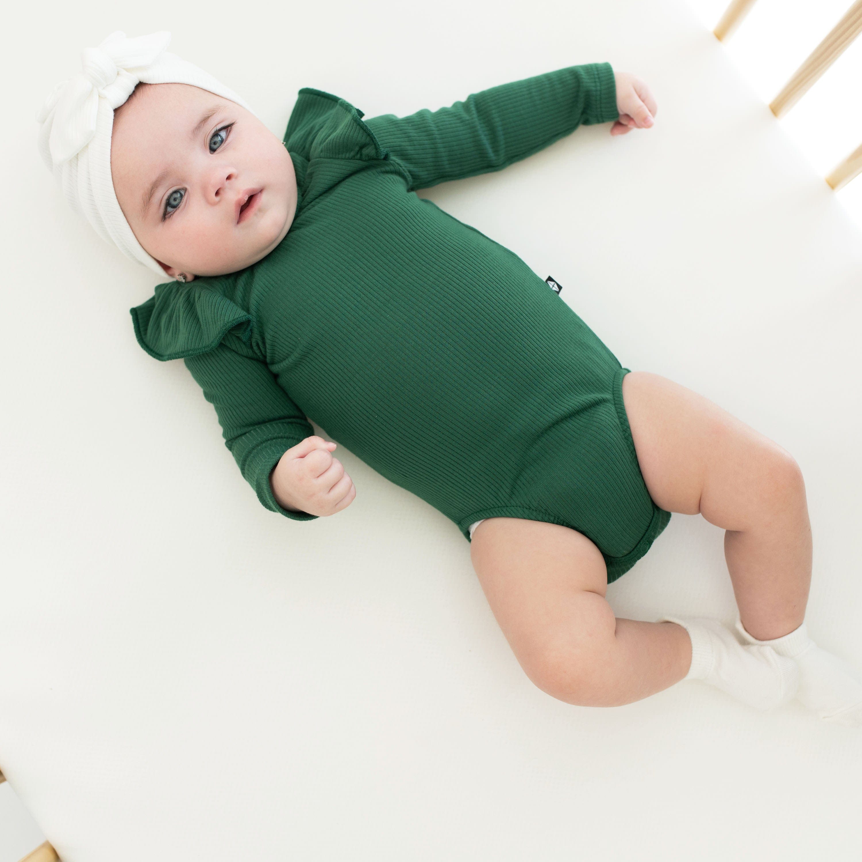 Kyte Baby Ribbed Long Sleeve Ruffle Bodysuit Ribbed Long Sleeve Ruffle Leotard in Forest