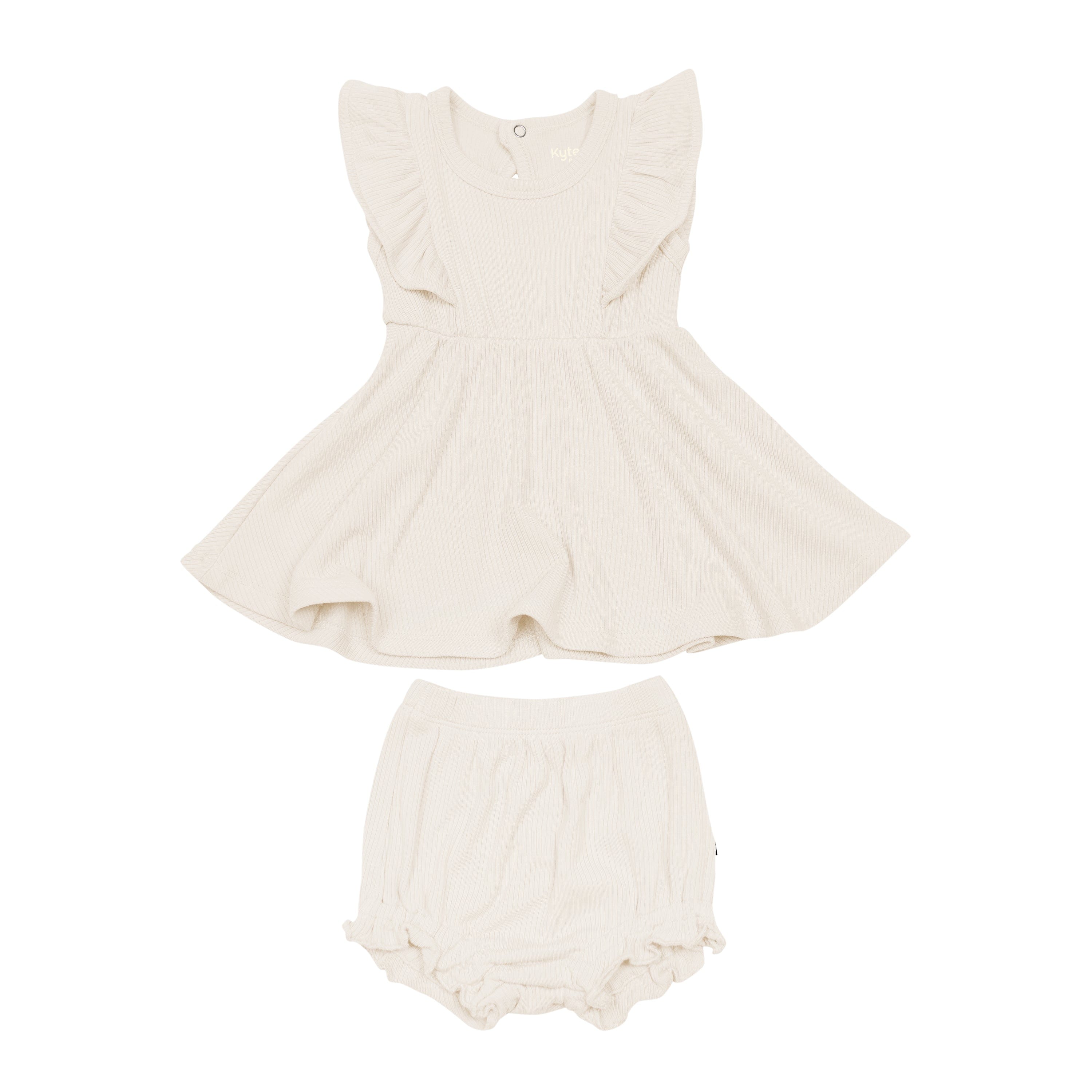 Kyte Baby Ribbed Peplum Dress Set in Oat