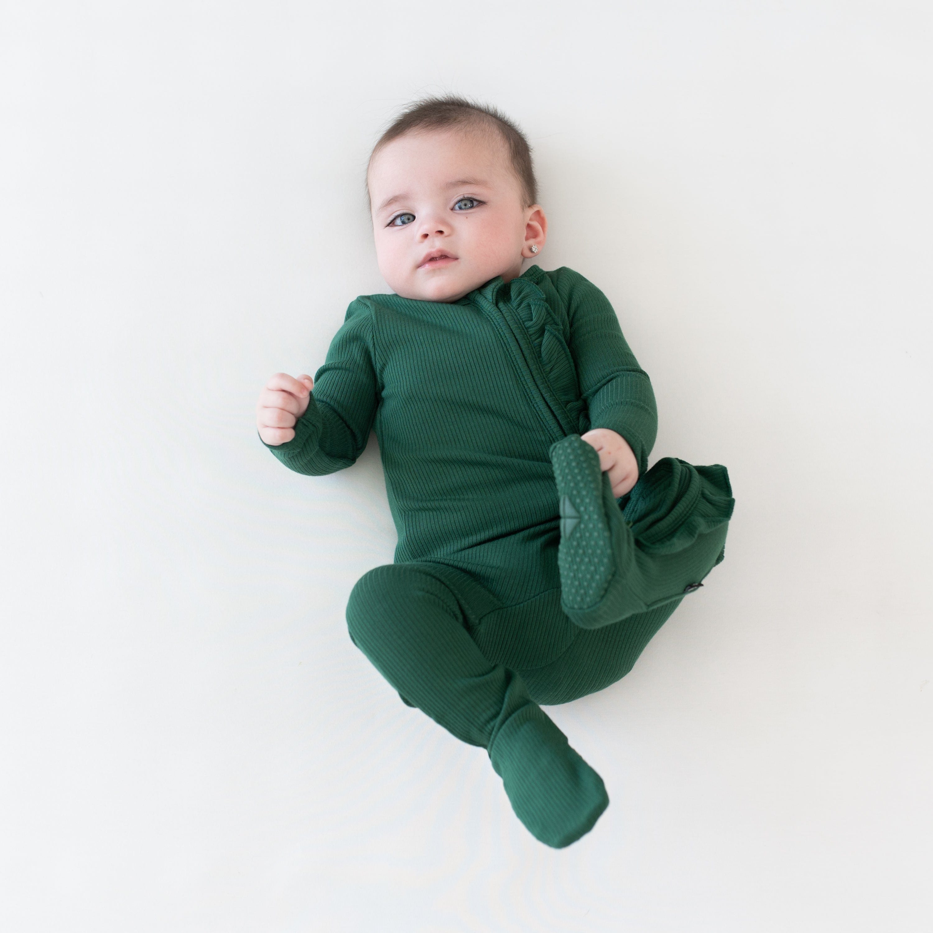 Kyte Baby Ribbed Ruffle Zipper Footie Ribbed Ruffle Zipper Footie in Forest