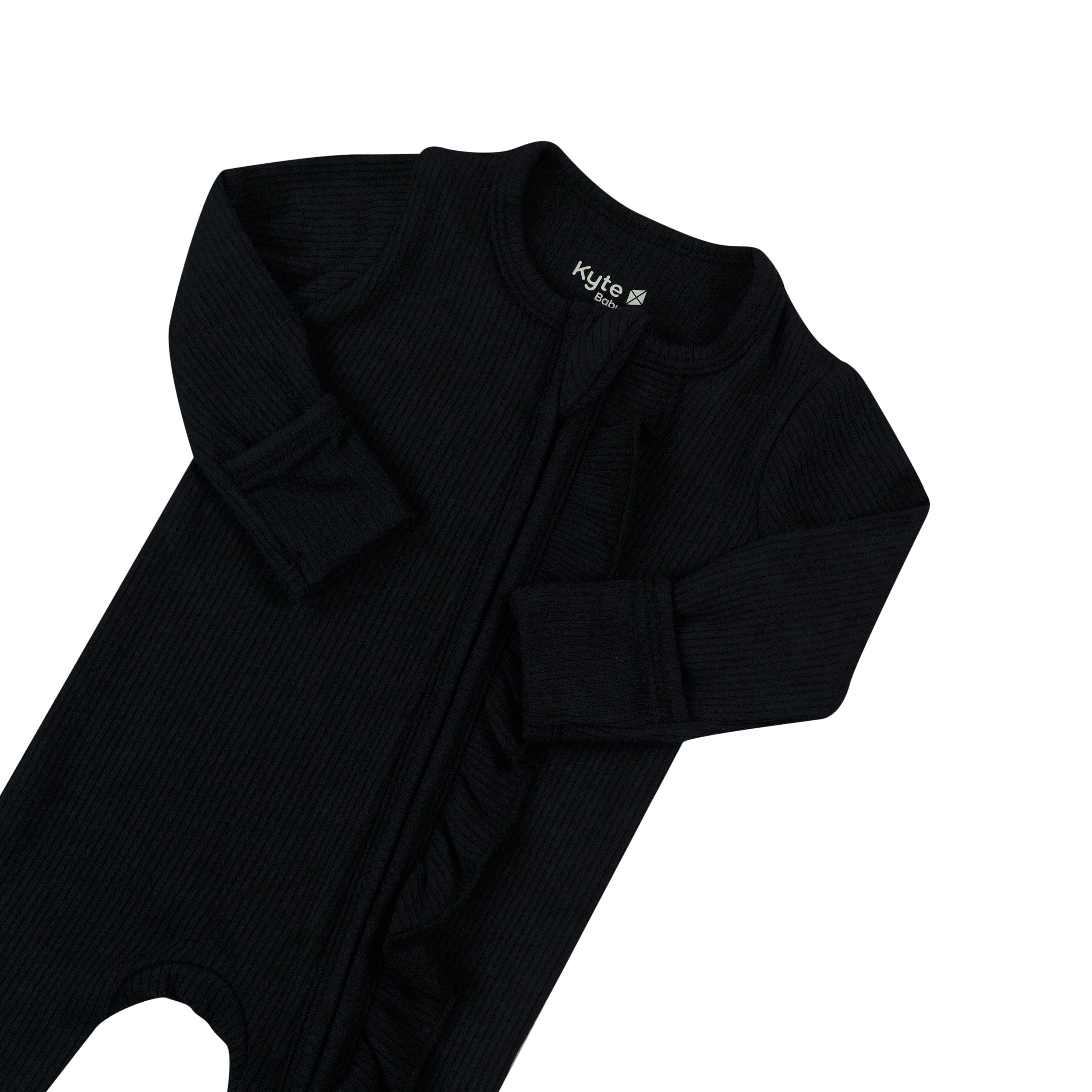Fold over cuffs on Kyte Baby Ribbed Ruffle Zipper Footie in Midnight