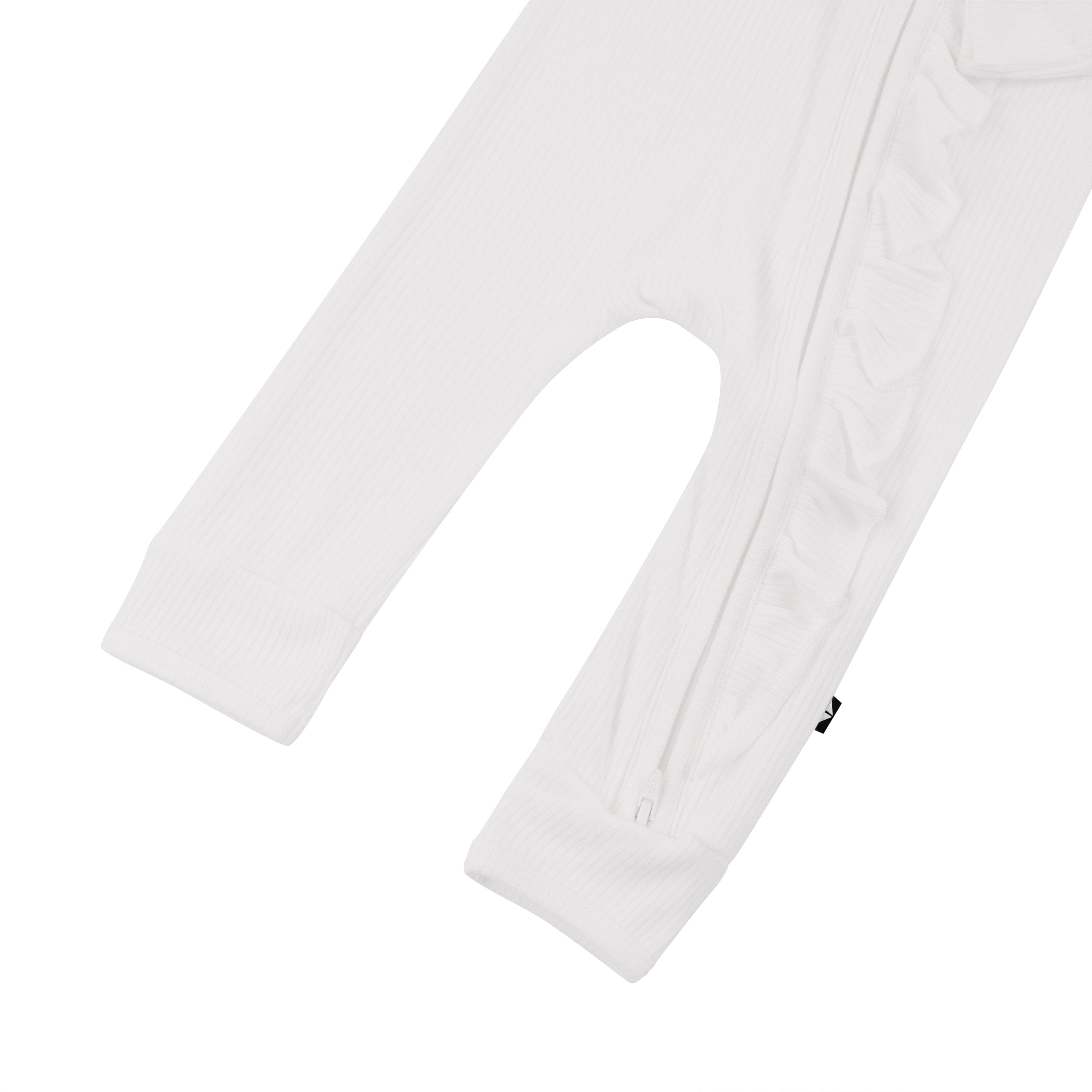 Open feet on Kyte Baby Ribbed Ruffle Zipper Romper in Cloud