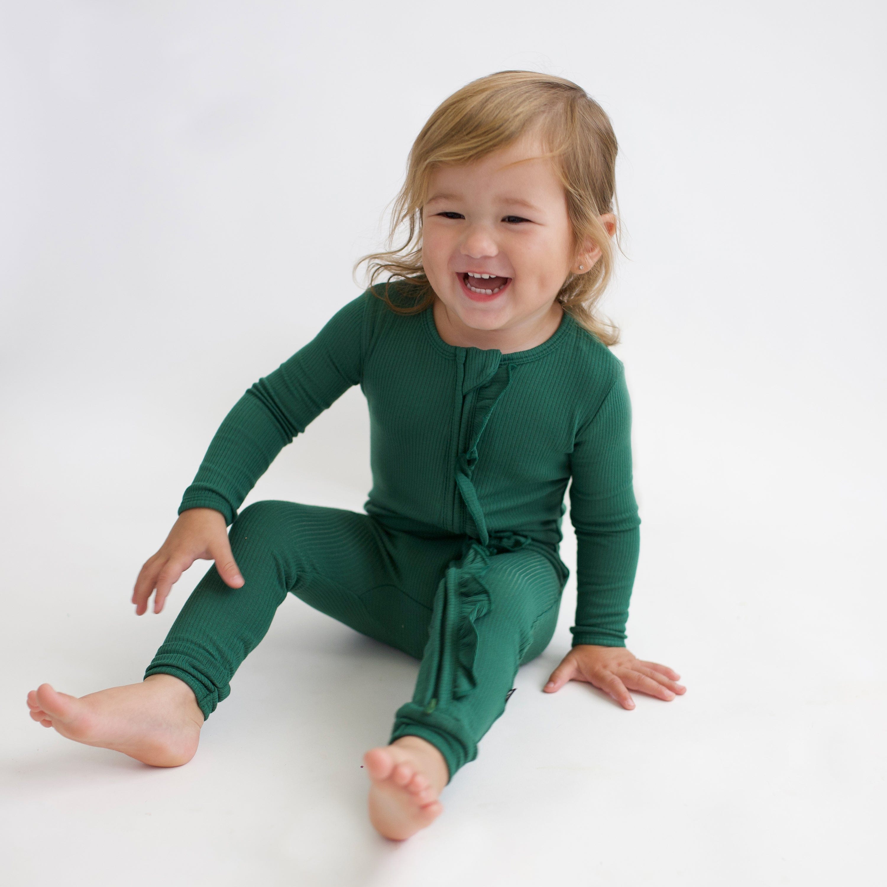 Kyte Baby Ribbed Ruffle Zipper Romper Ribbed Ruffle Zipper Romper in Forest