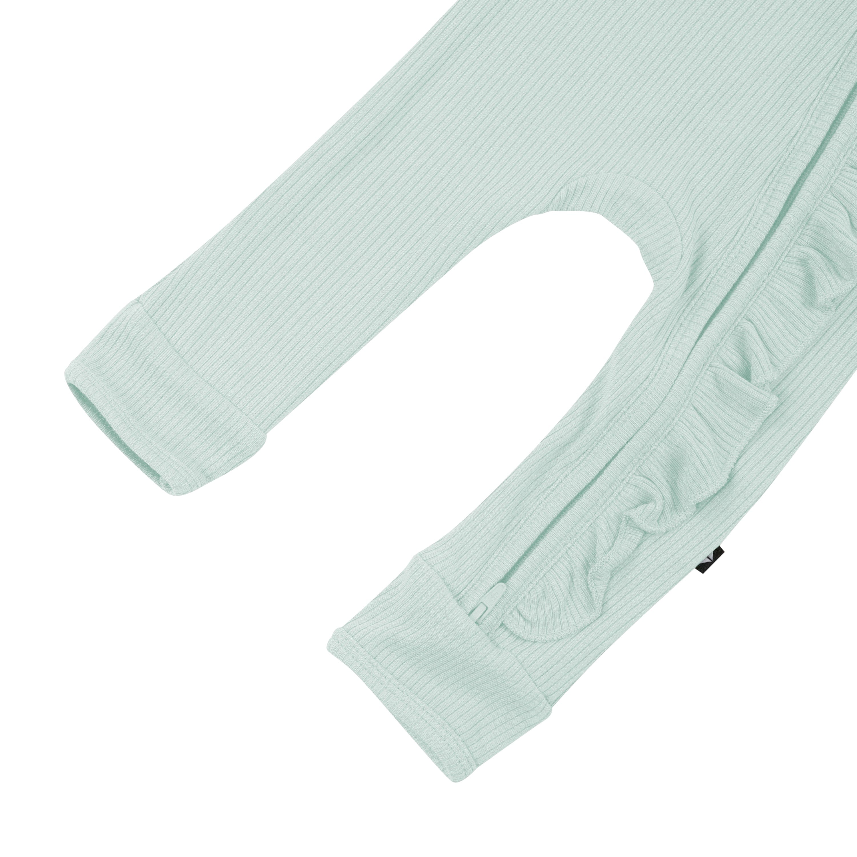 Open feet on Kyte Baby Ribbed Ruffle Zipper Romper in Sage