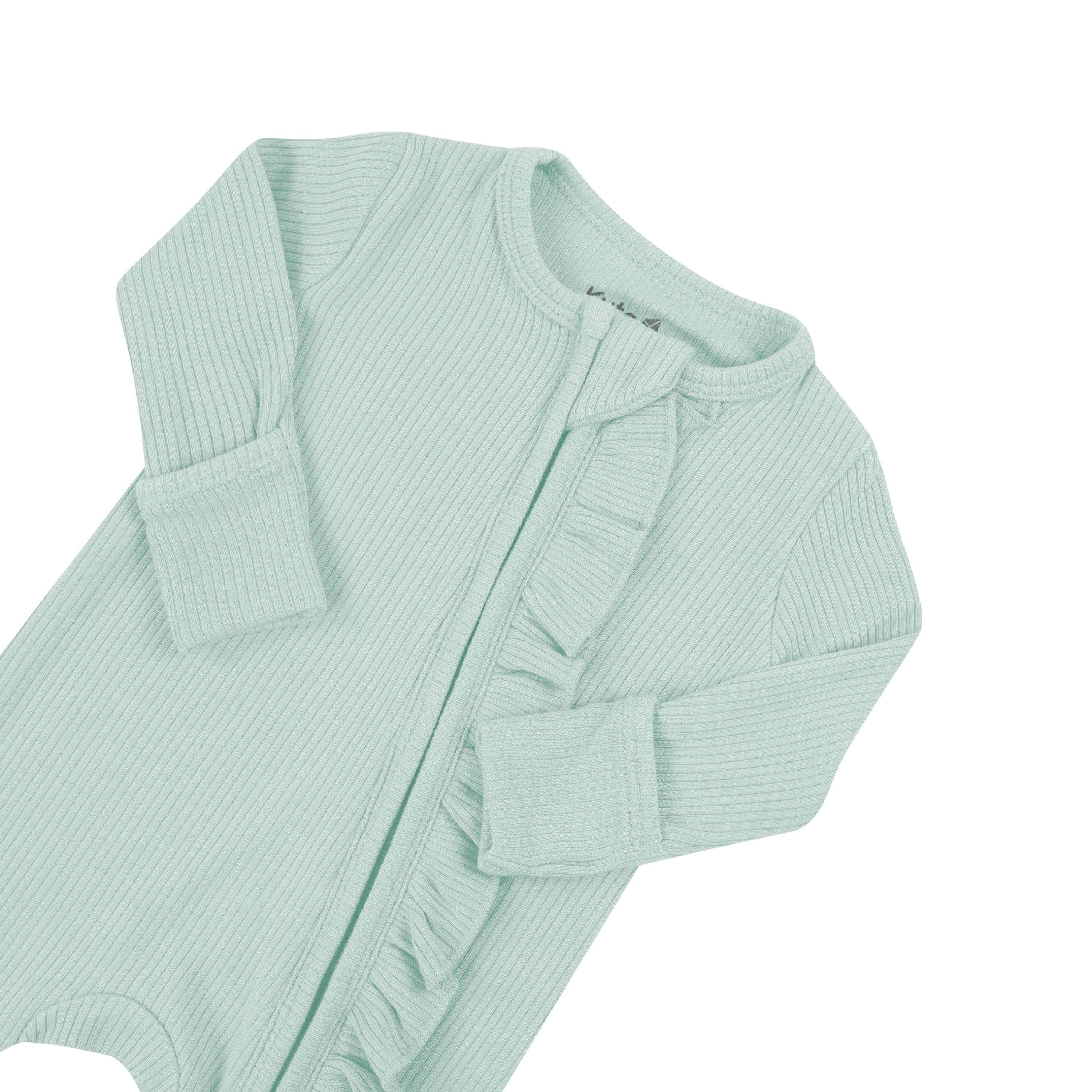 Fold over cuffs on Kyte Baby Ribbed Ruffle Zipper Romper in Sage