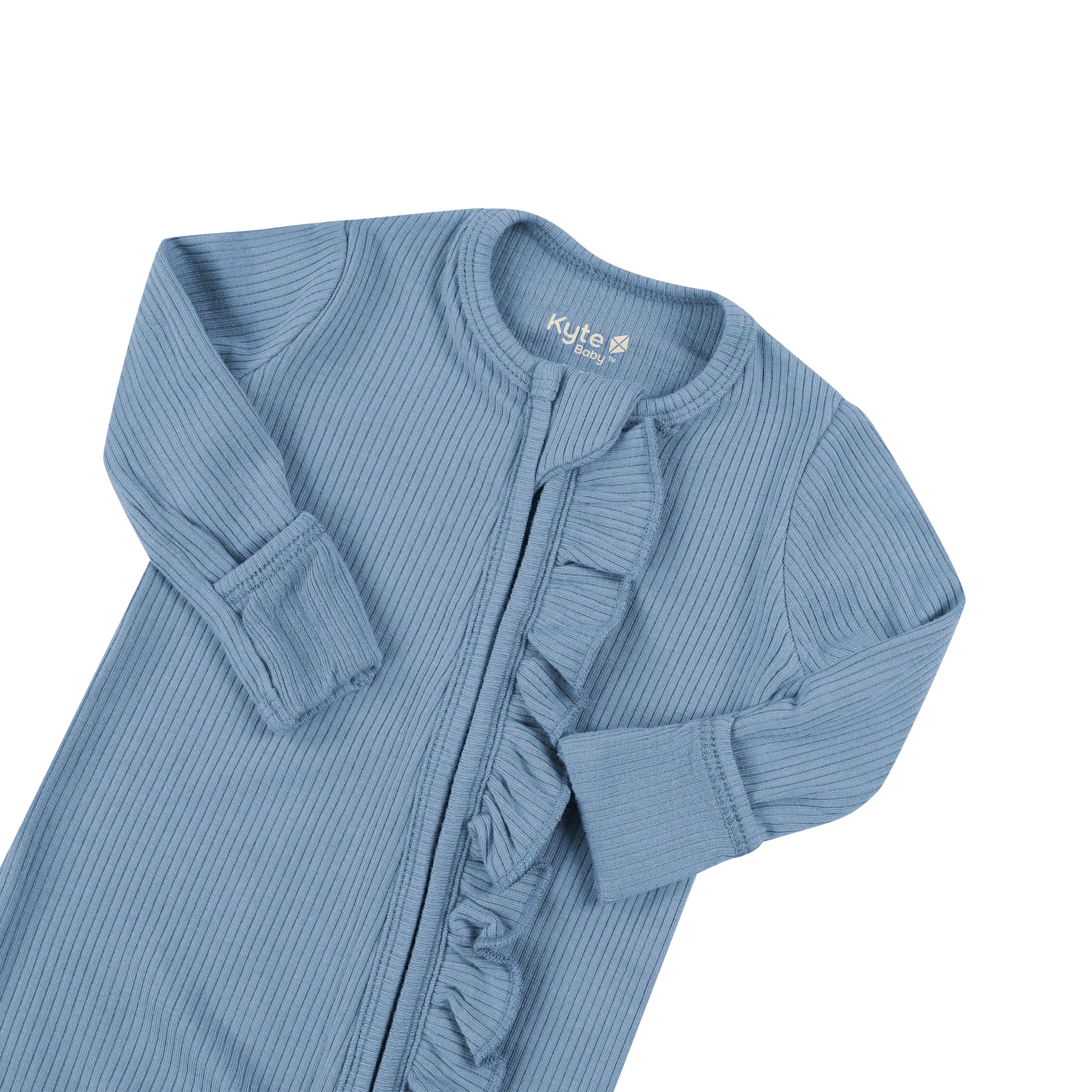 Fold over cuffs on Kyte Baby Ribbed Ruffle Zipper Romper in Slate