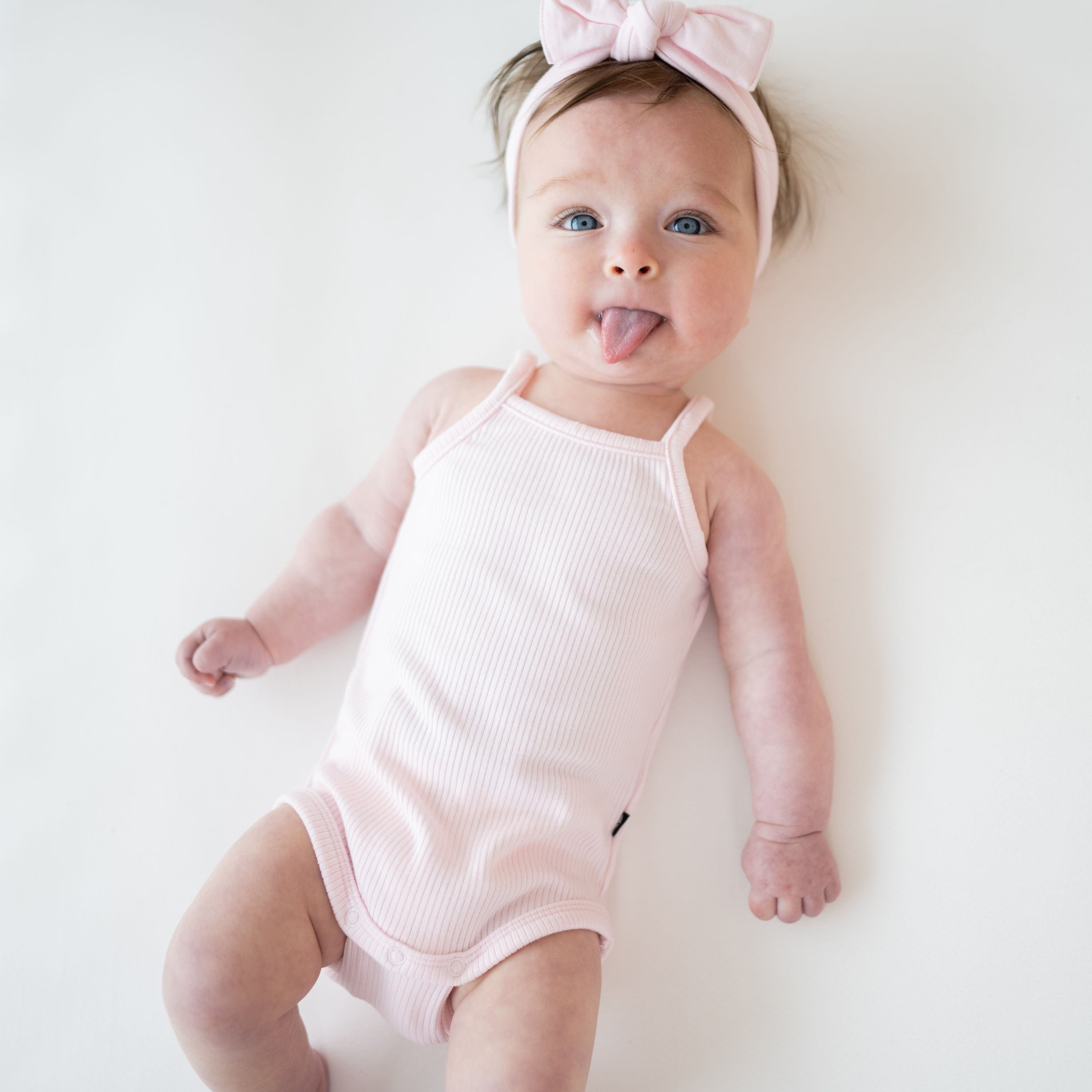 Kyte Baby Ribbed Spaghetti Strap Bodysuit Ribbed Spaghetti Strap Bodysuit in Sakura