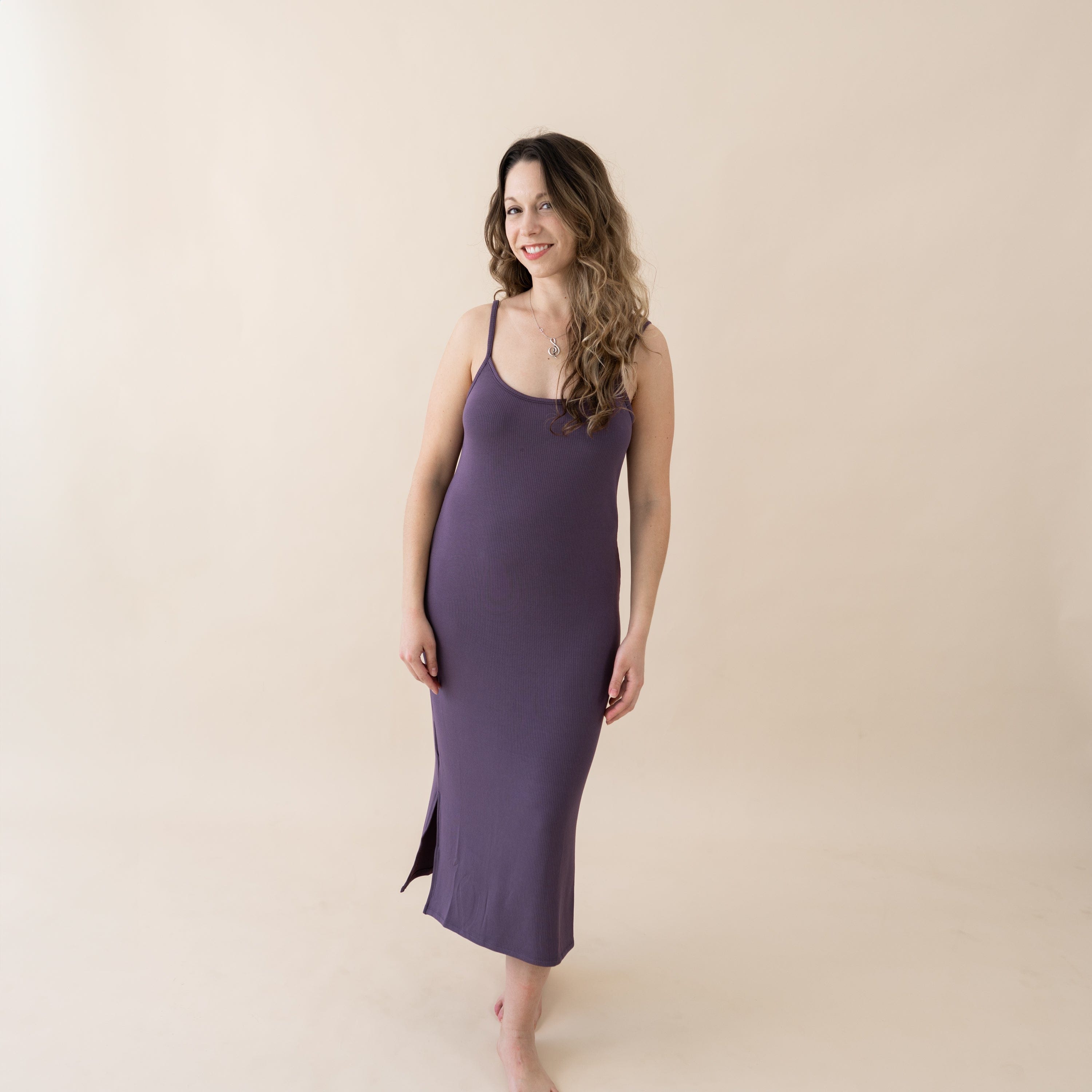 Woman wearing Kyte Baby Ribbed Cami Dress in Currant