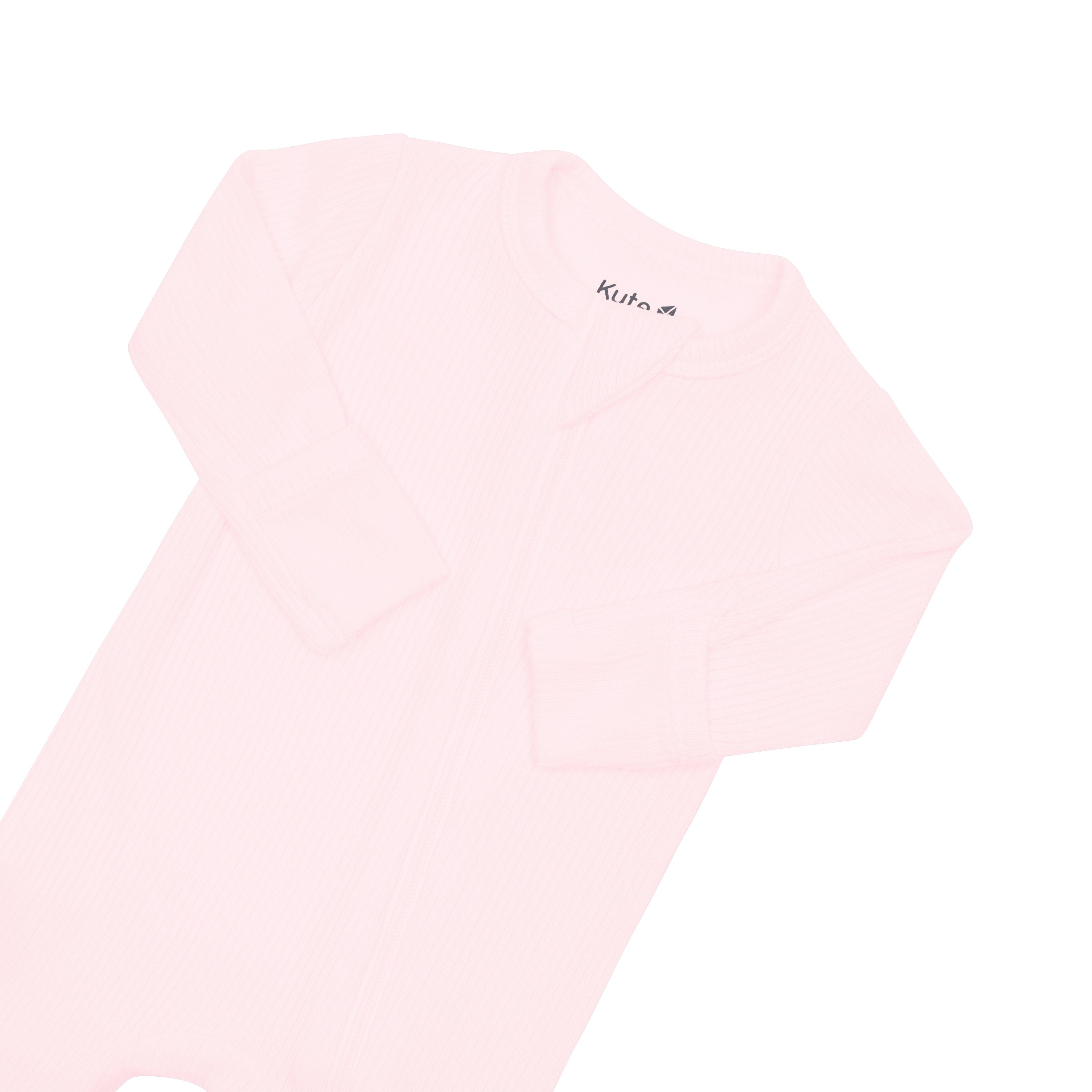 Fold-over cuffs on Kyte Baby Ribbed Zippered Footie in Sakura