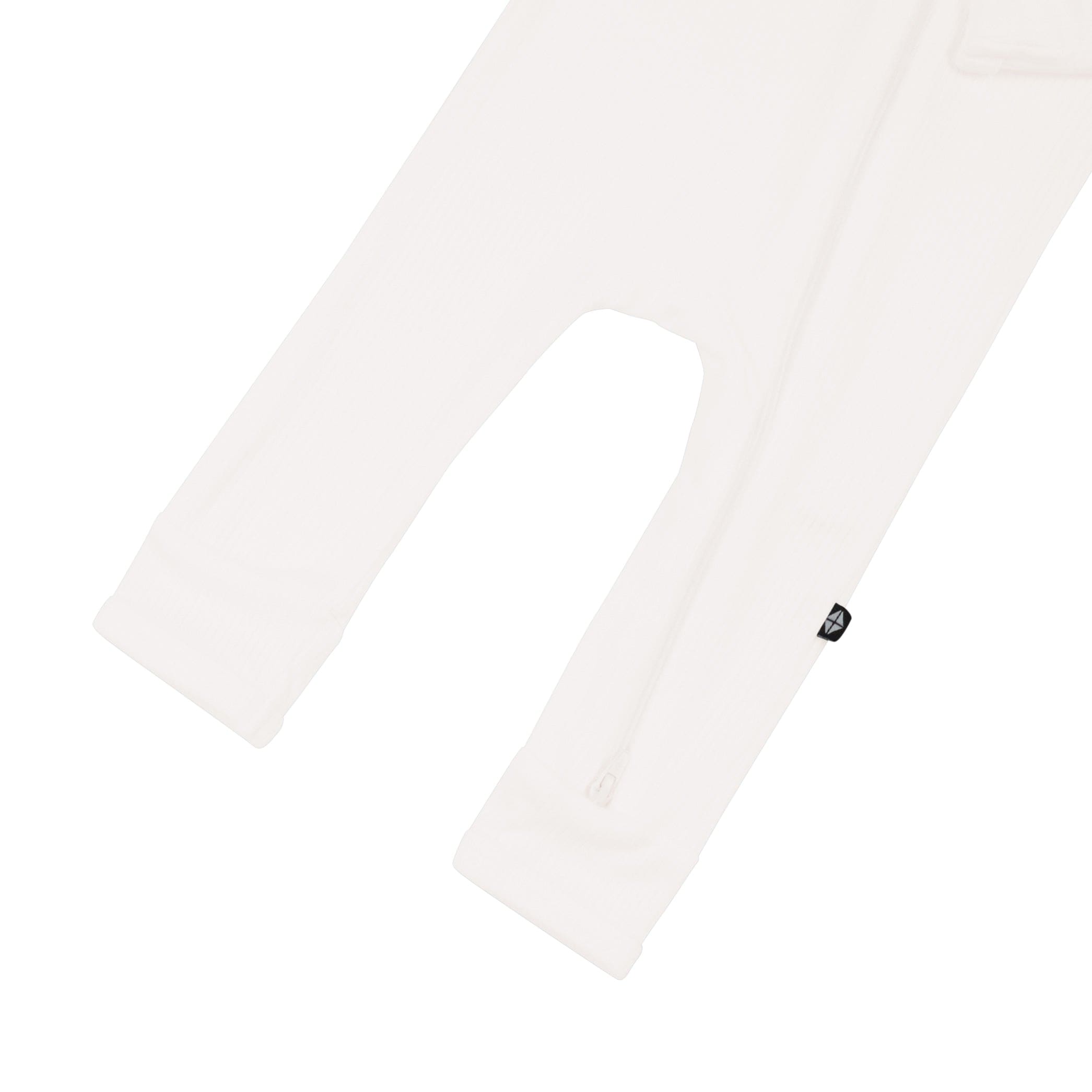 Open feet on Kyte Baby Ribbed Zippered Romper in Cloud
