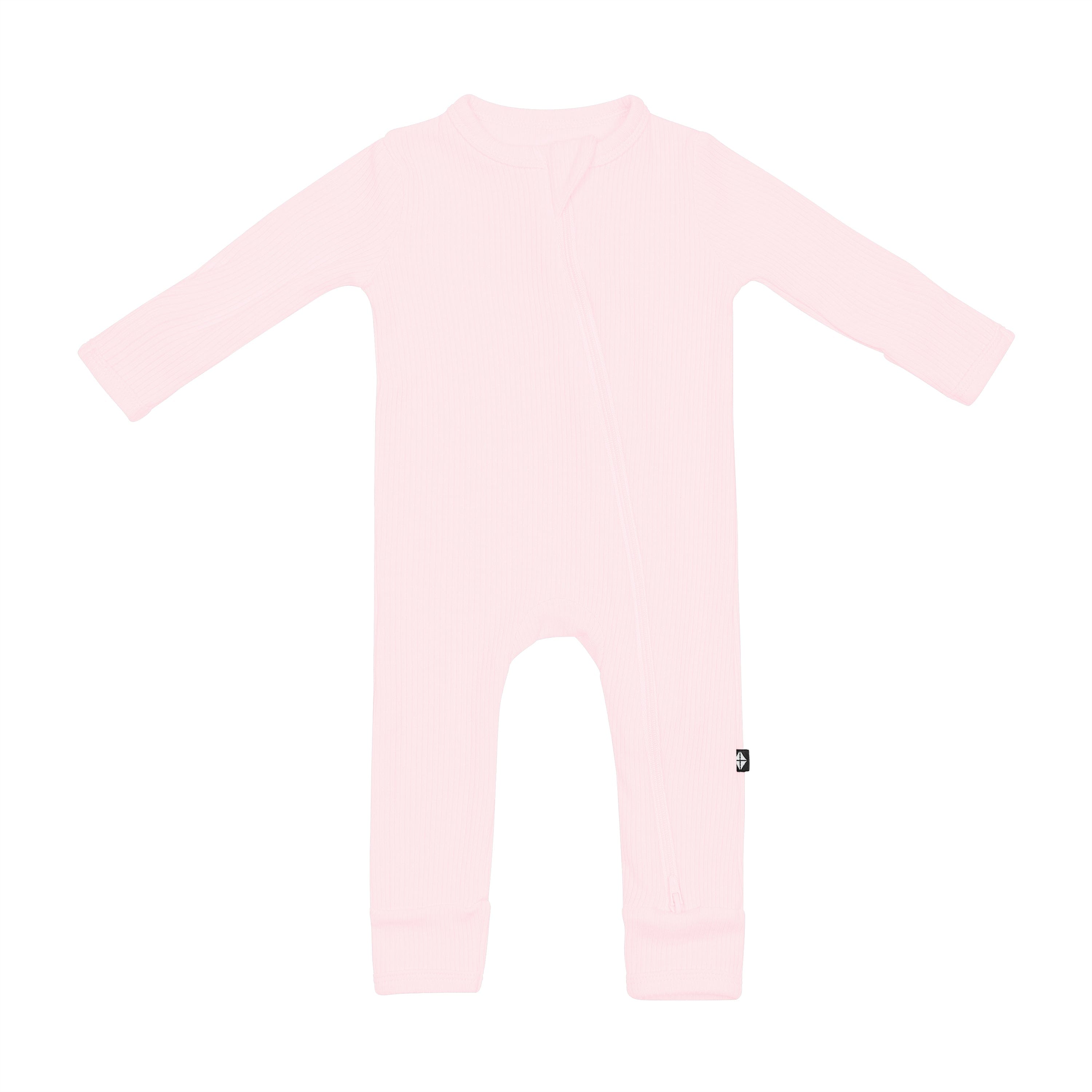 Kyte Baby Ribbed Zippered Romper in Sakura pink