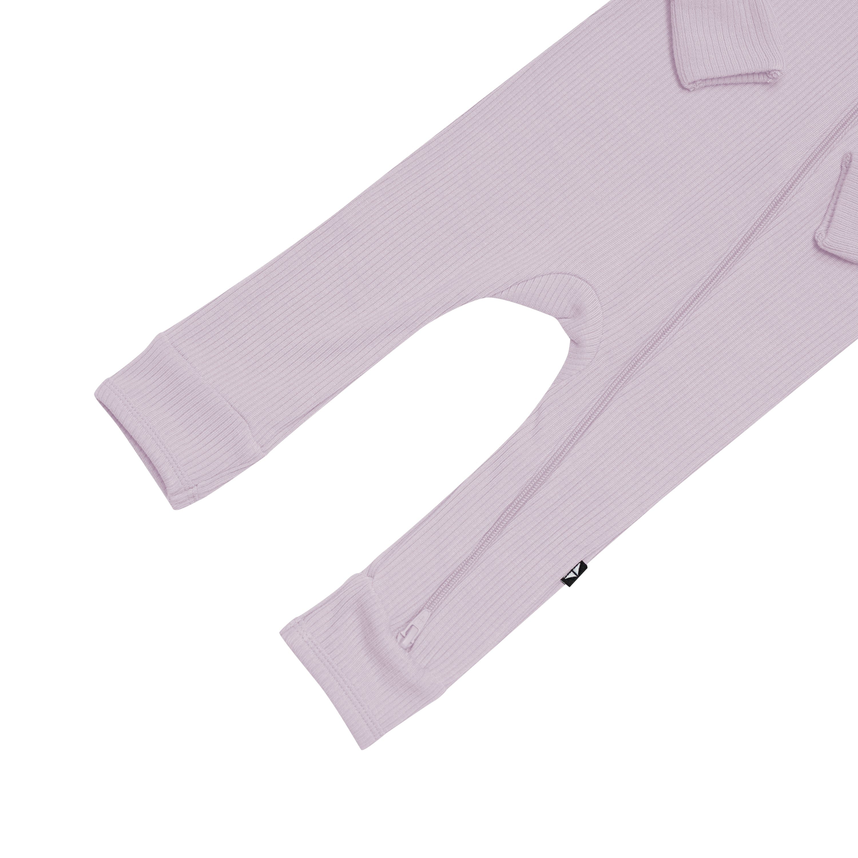 Open feet on Kyte Baby Ribbed Zippered Romper in Wisteria
