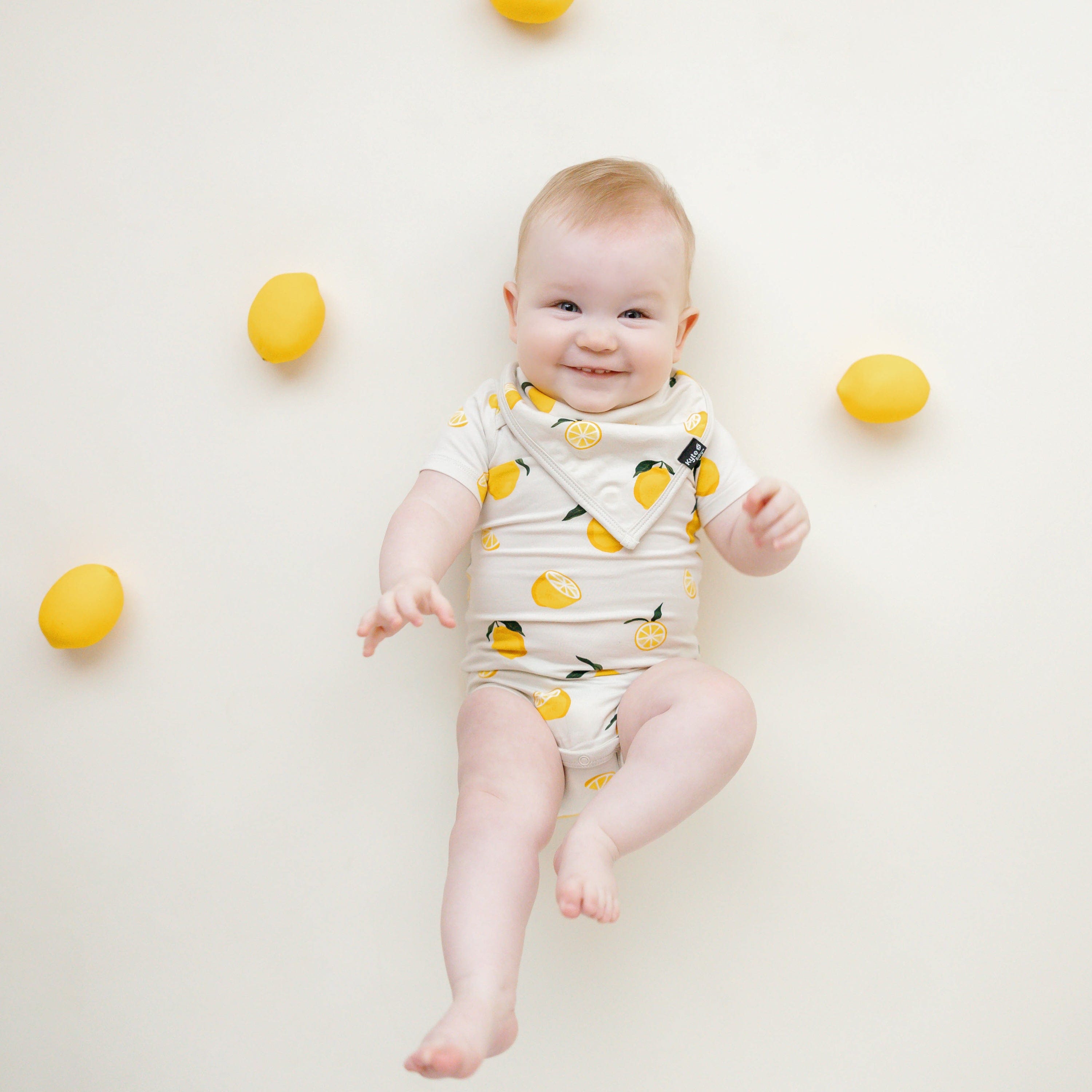 Kyte Baby Short Sleeve Bodysuits Bodysuit in Lemon
