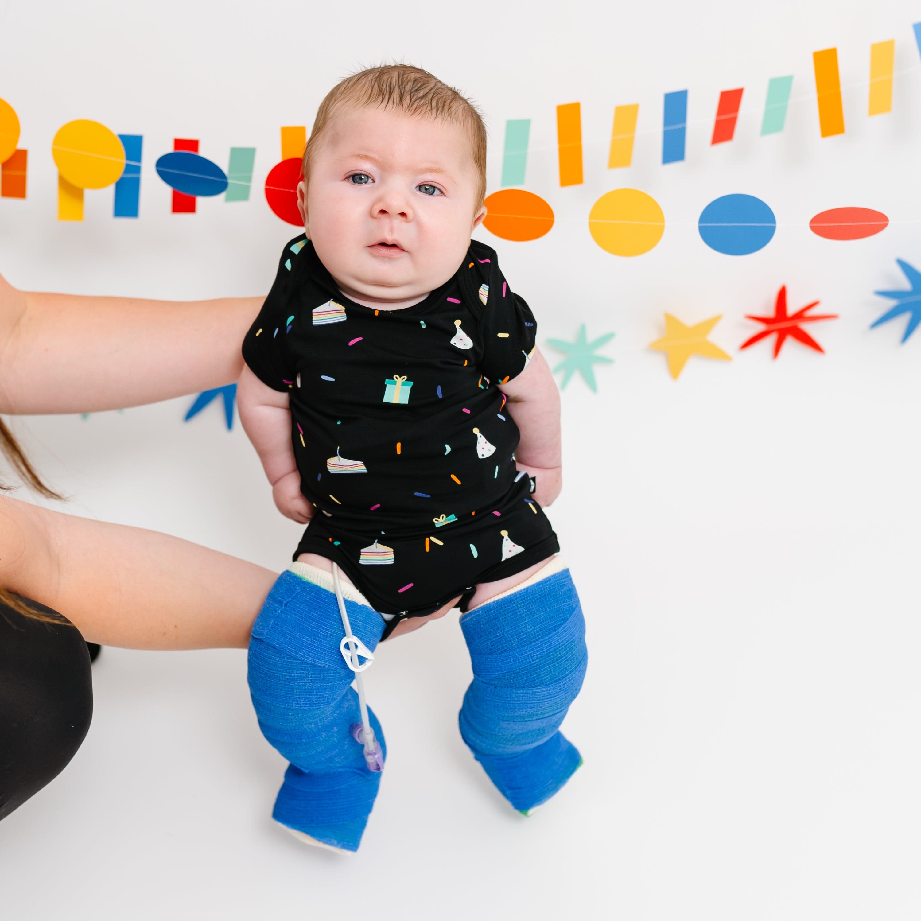 Kyte Baby Short Sleeve Bodysuits Bodysuit in Midnight Party
