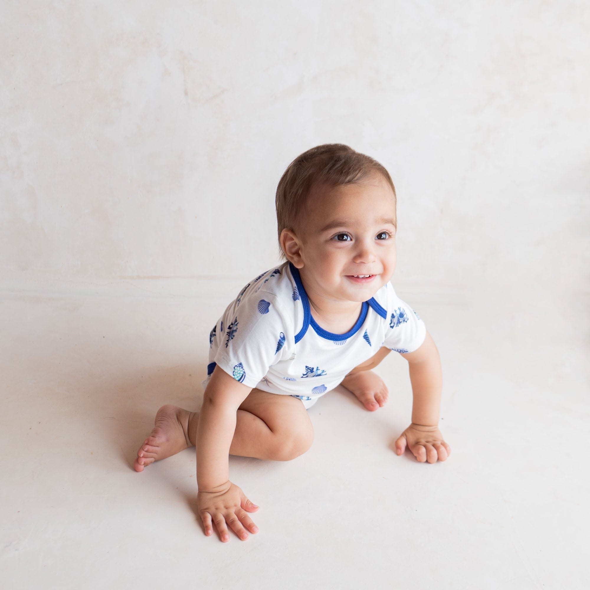 Kyte Baby Short Sleeve Bodysuits Bodysuit in Royal Shell