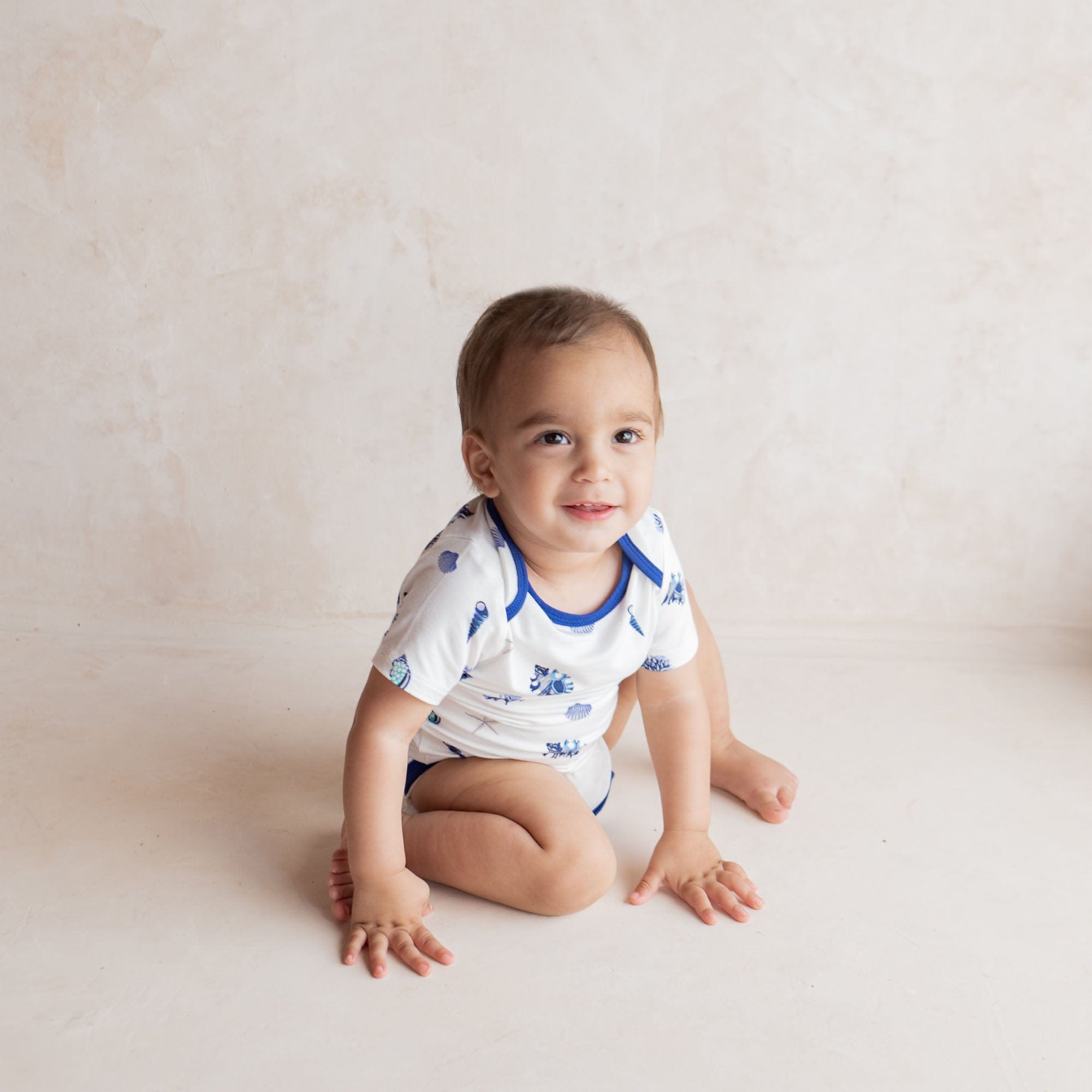 Kyte Baby Short Sleeve Bodysuits Bodysuit in Royal Shell