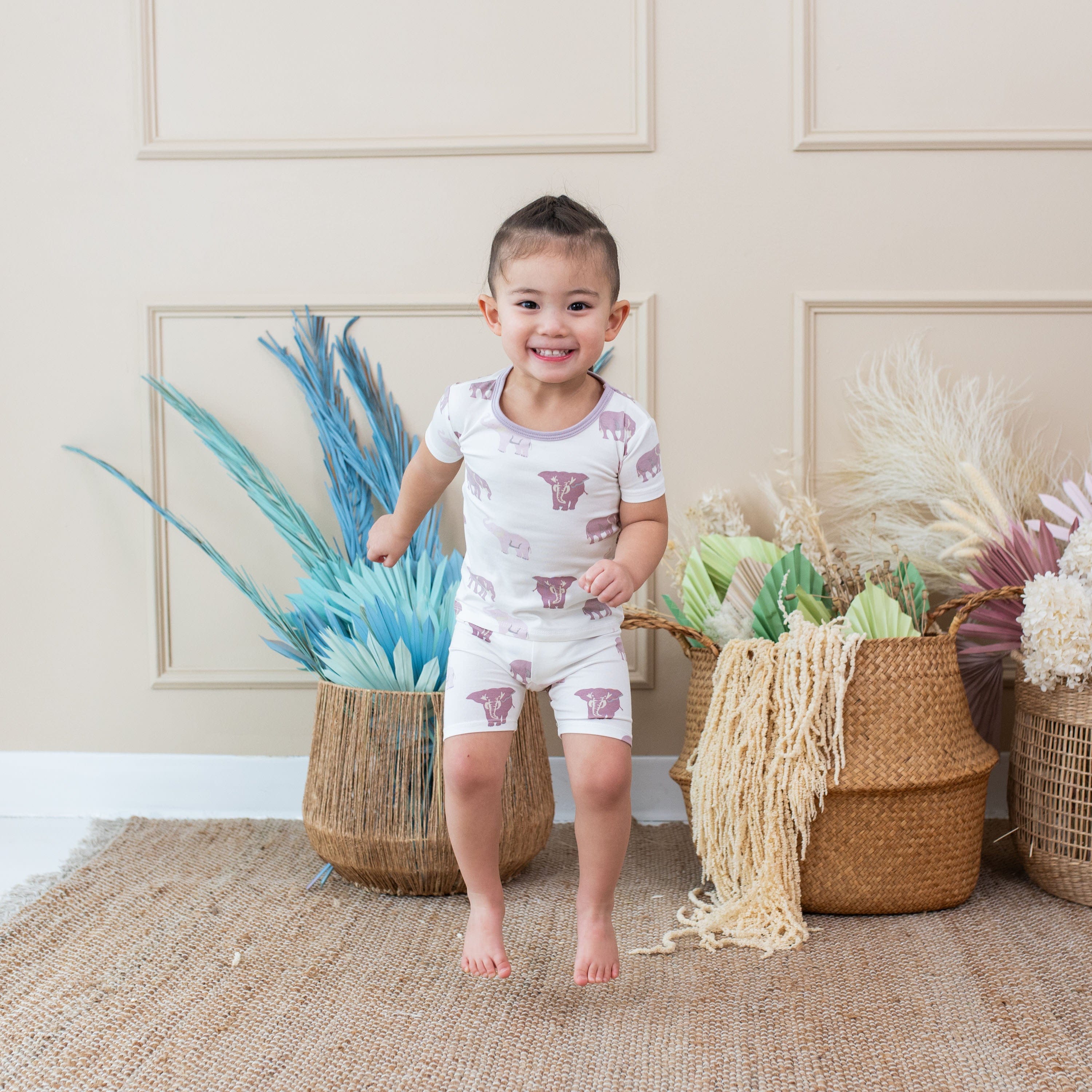 Toddler wearing Kyte Baby bamboo Short Sleeve Pajamas in Elephant