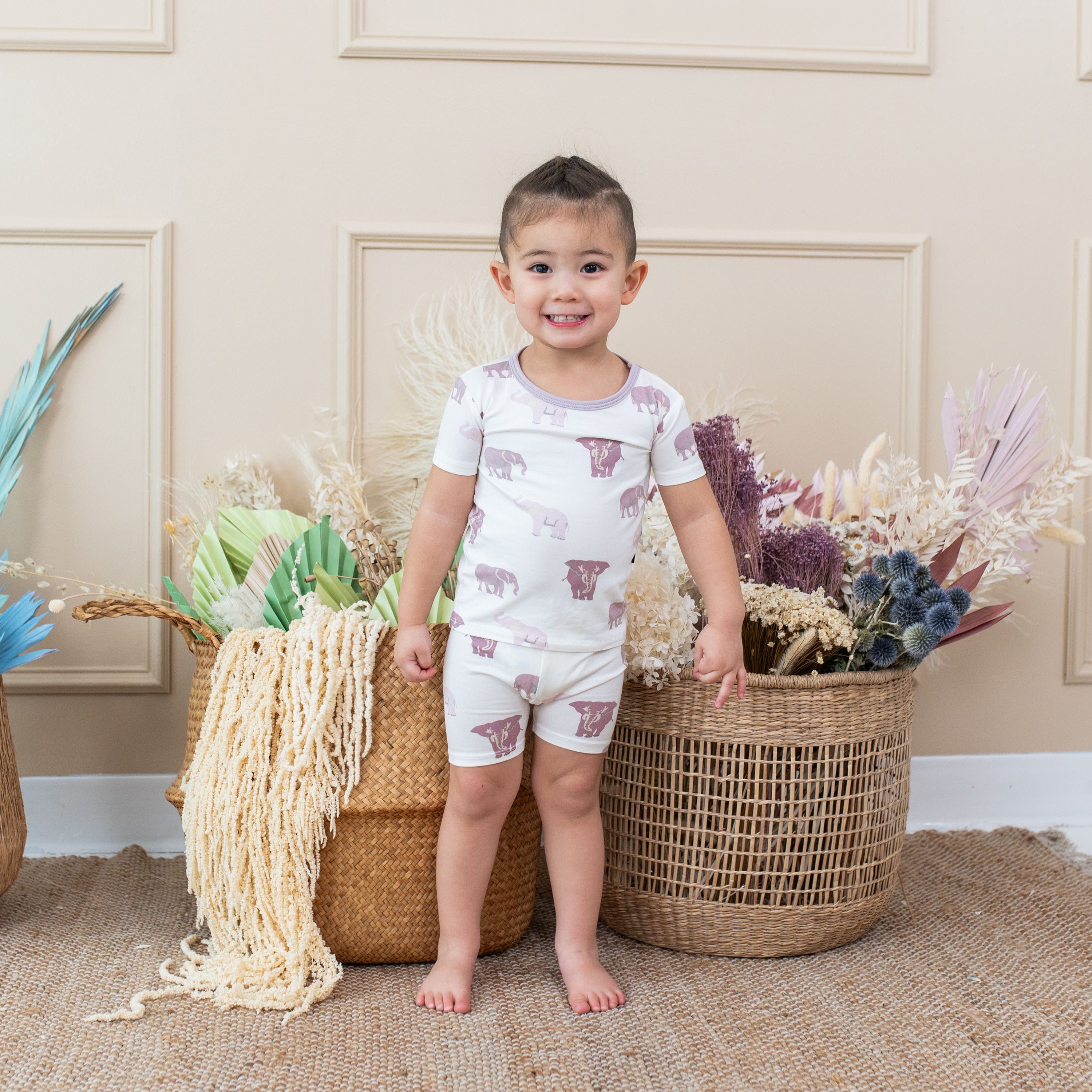 Child wearing Kyte Baby Short Sleeve Pajamas in Elephant