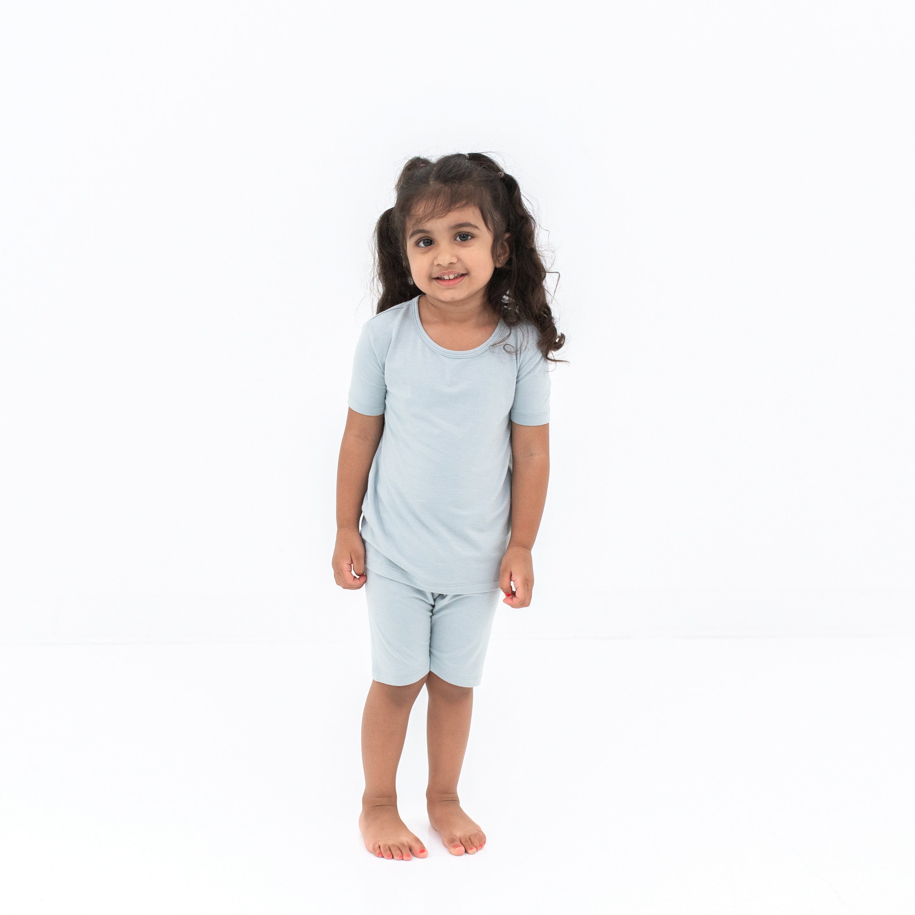 Toddler wearing two piece Short Sleeve Pajama Set in Fog