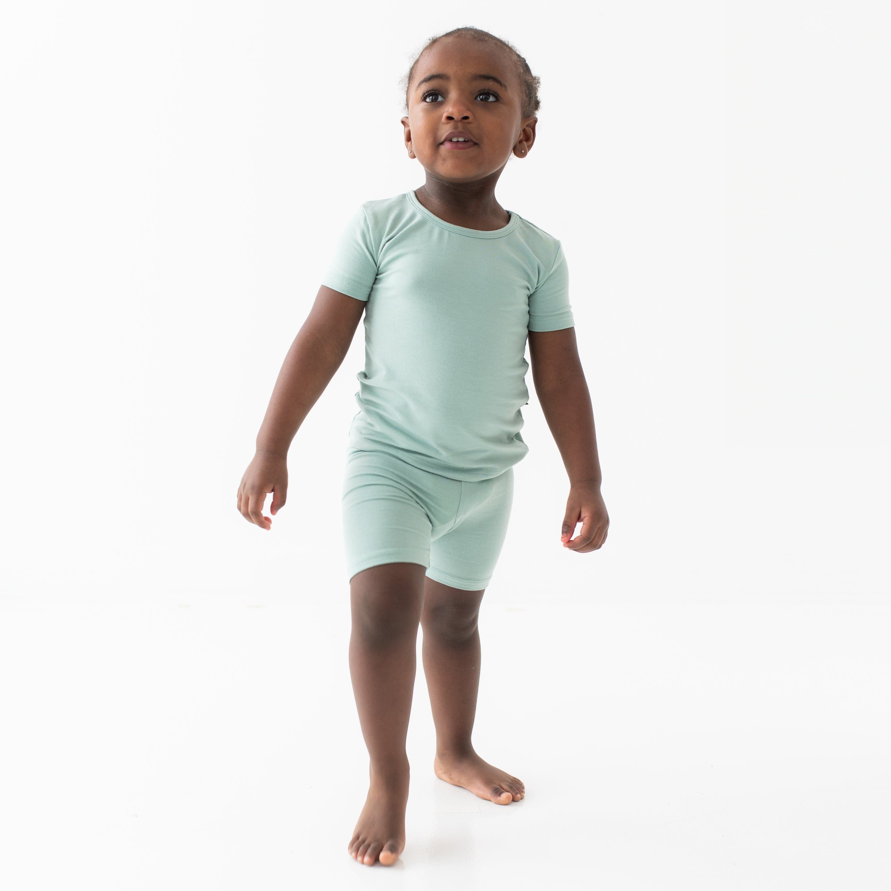Toddler wearing Short Sleeve Kids Pajama Set in Sage Green