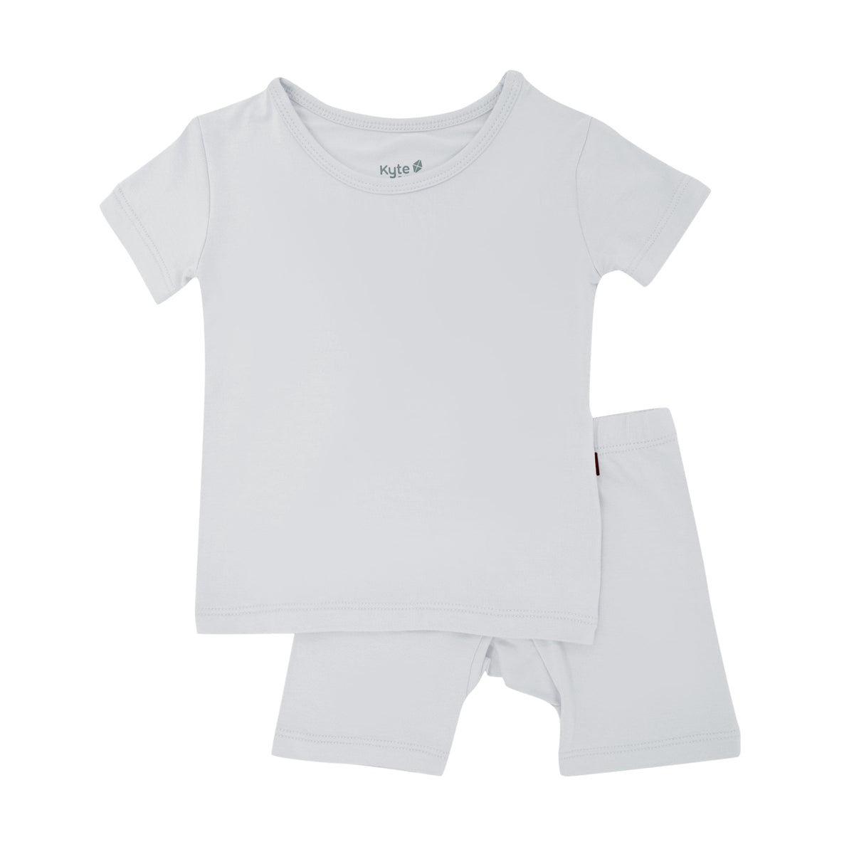 Flat lay of Kyte Baby Short Sleeve Pajamas in Storm