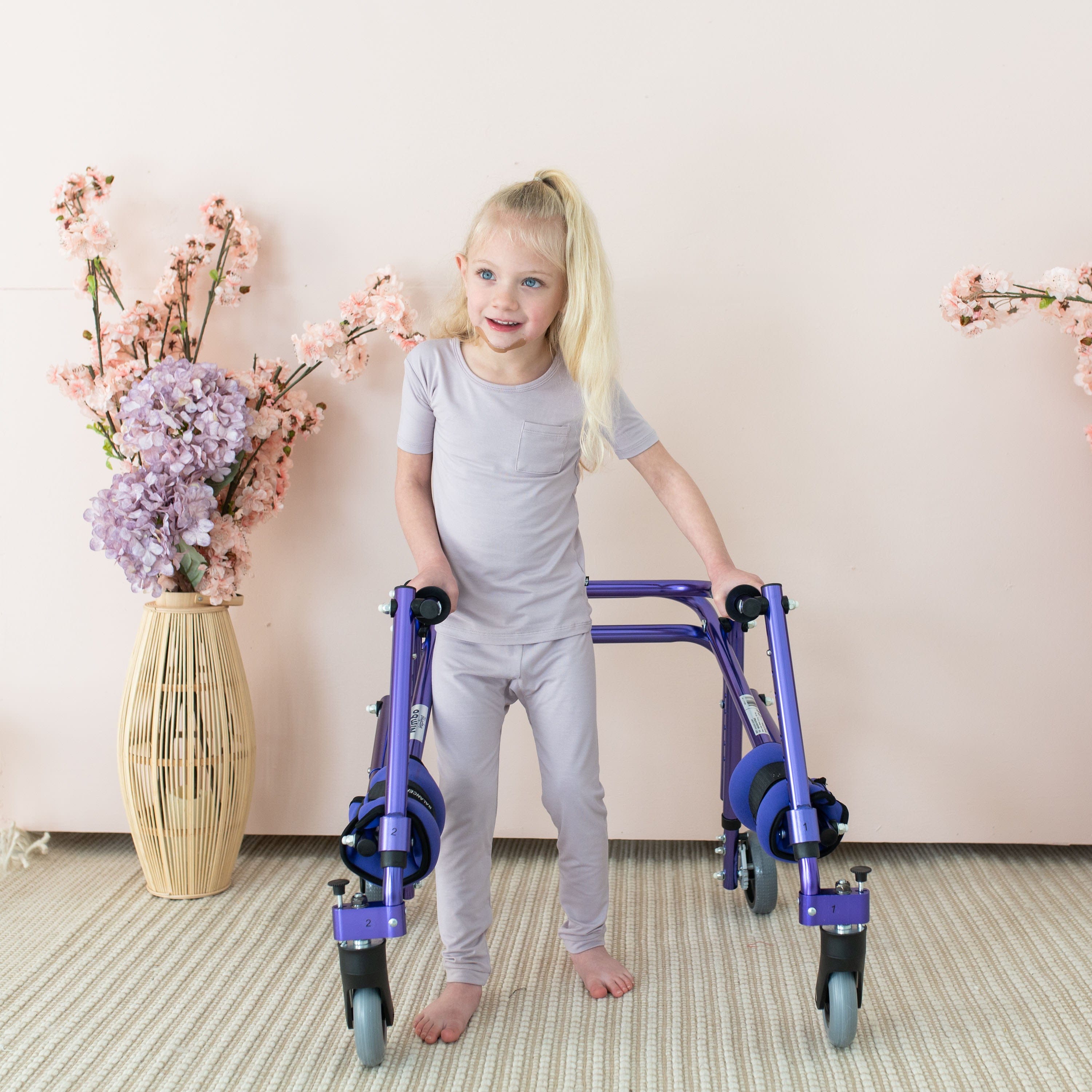 Toddler wearing Kyte Baby Short Sleeve with Pants Pajamas in Wisteria