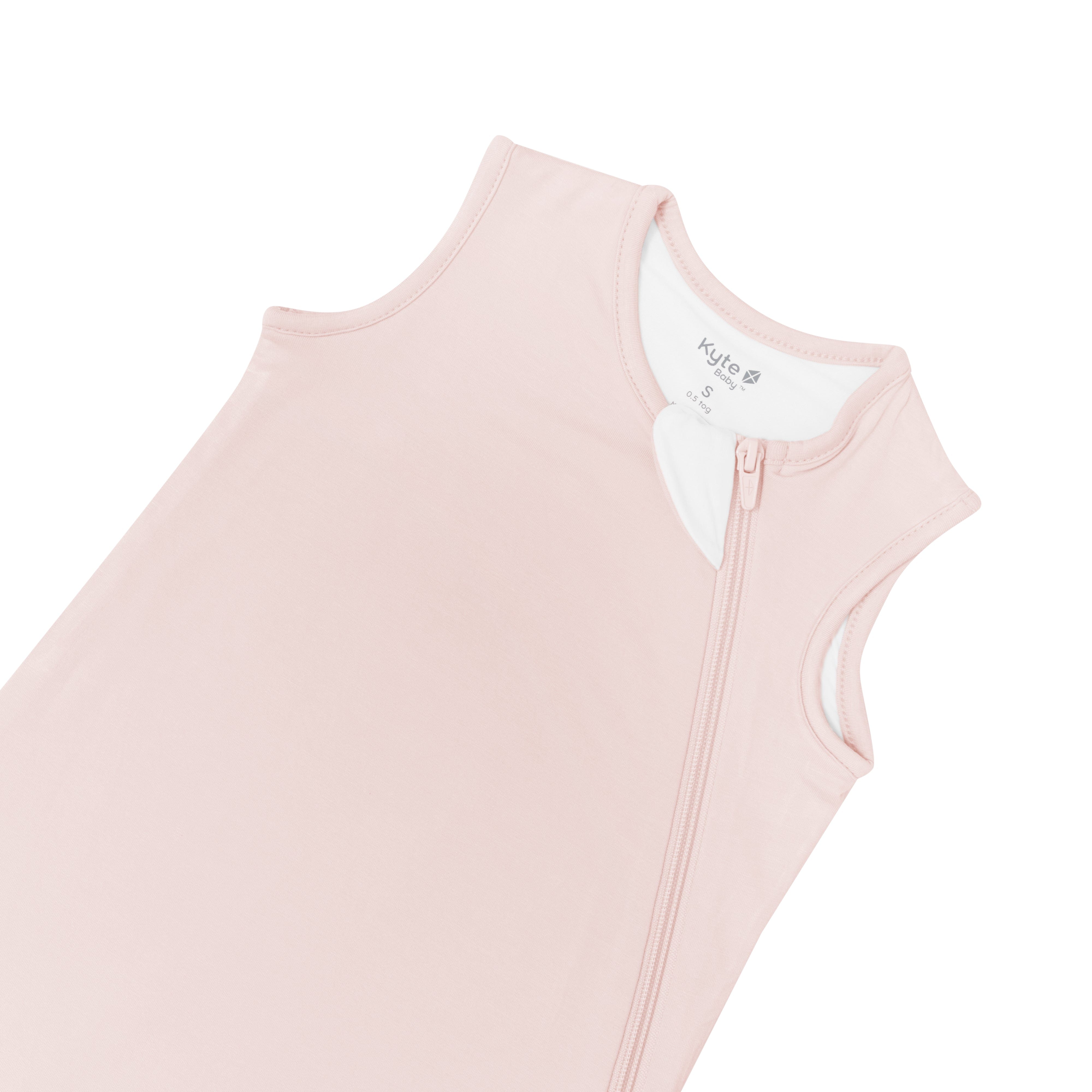Close up of zipper garage on Kyte Baby Sleep Bag in Blush 0.5