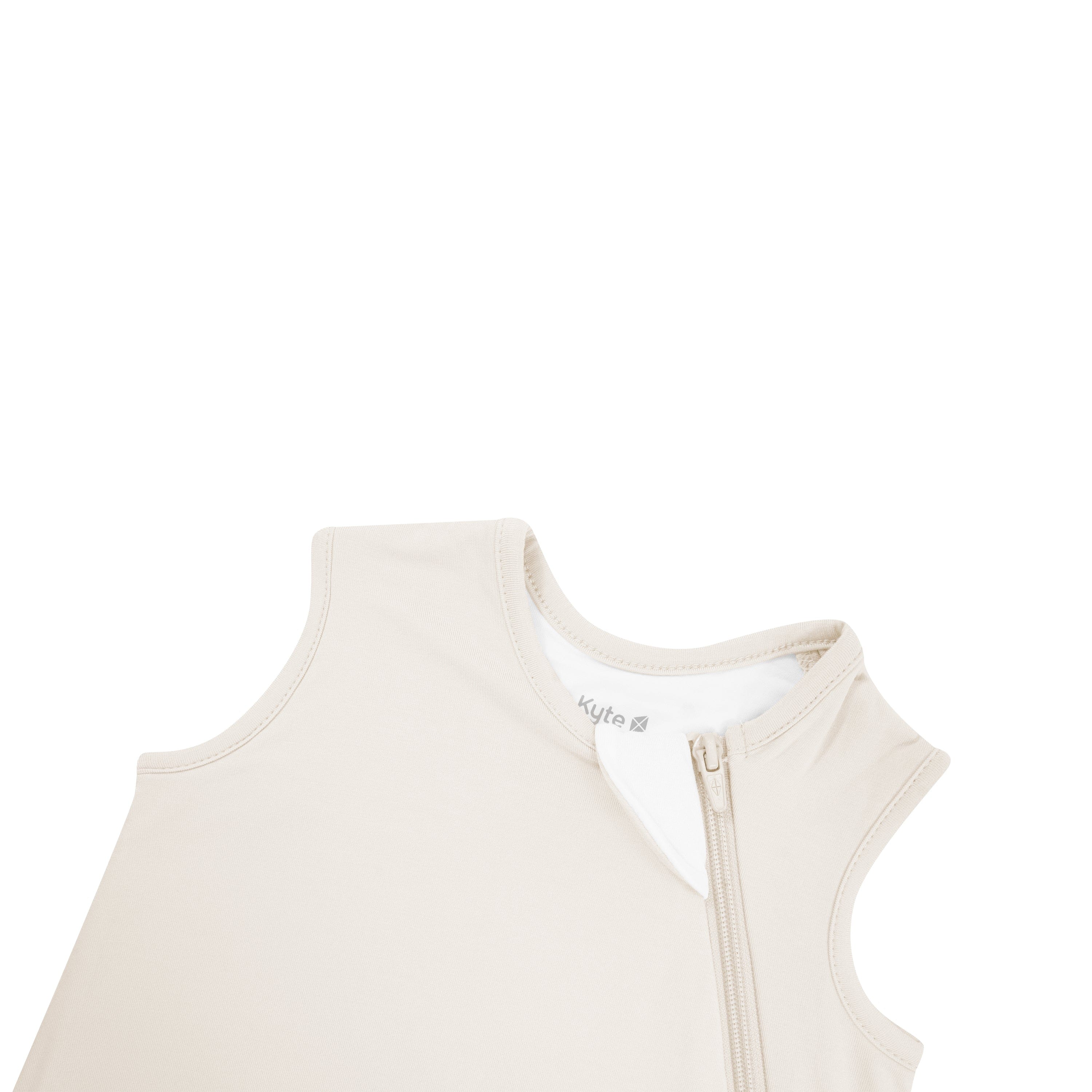 Close up of zipper garage on Kyte Baby Sleep Bag in Oat 0.5