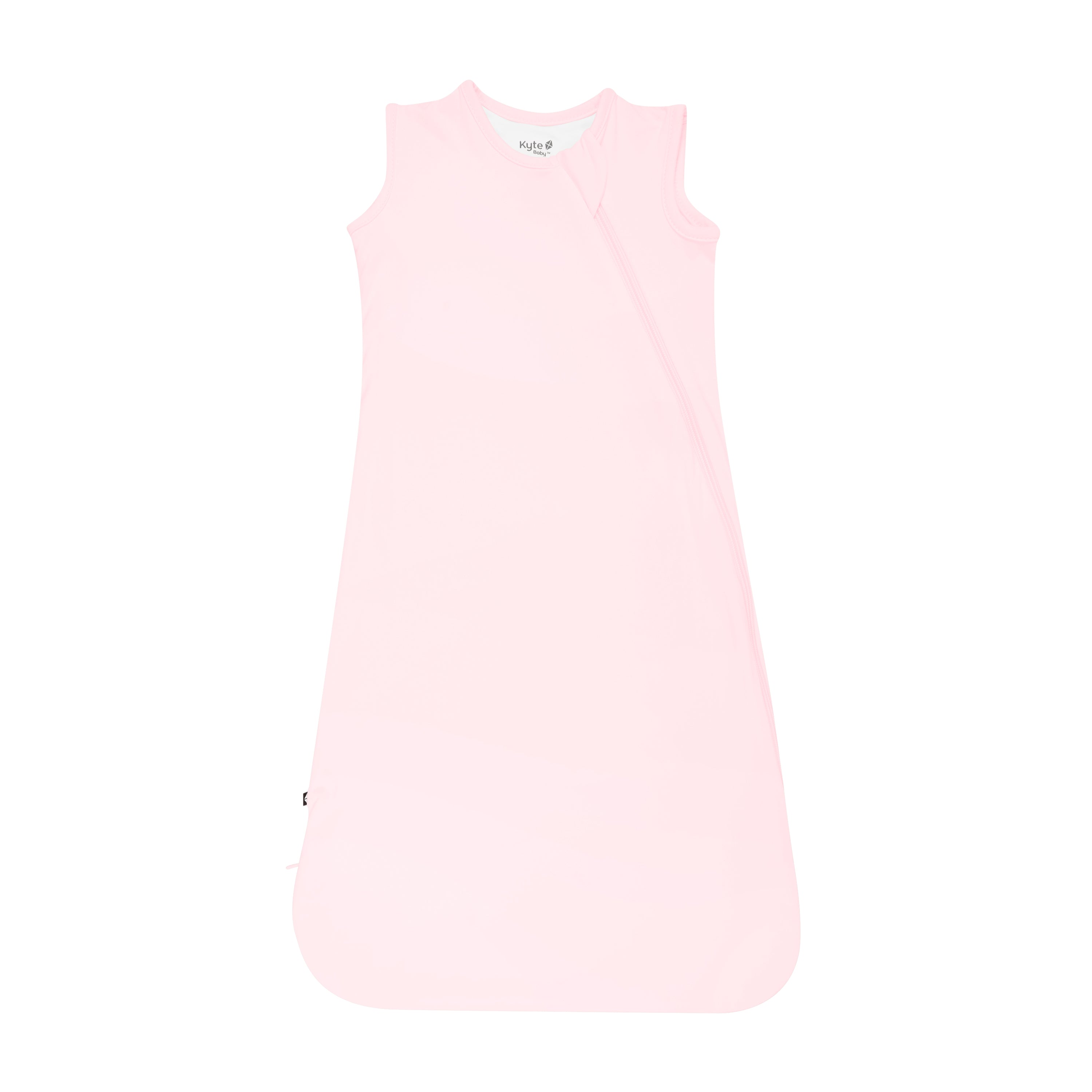 Flat lay photo of the Kyte Baby Sleep Bag in Sakura 0.5