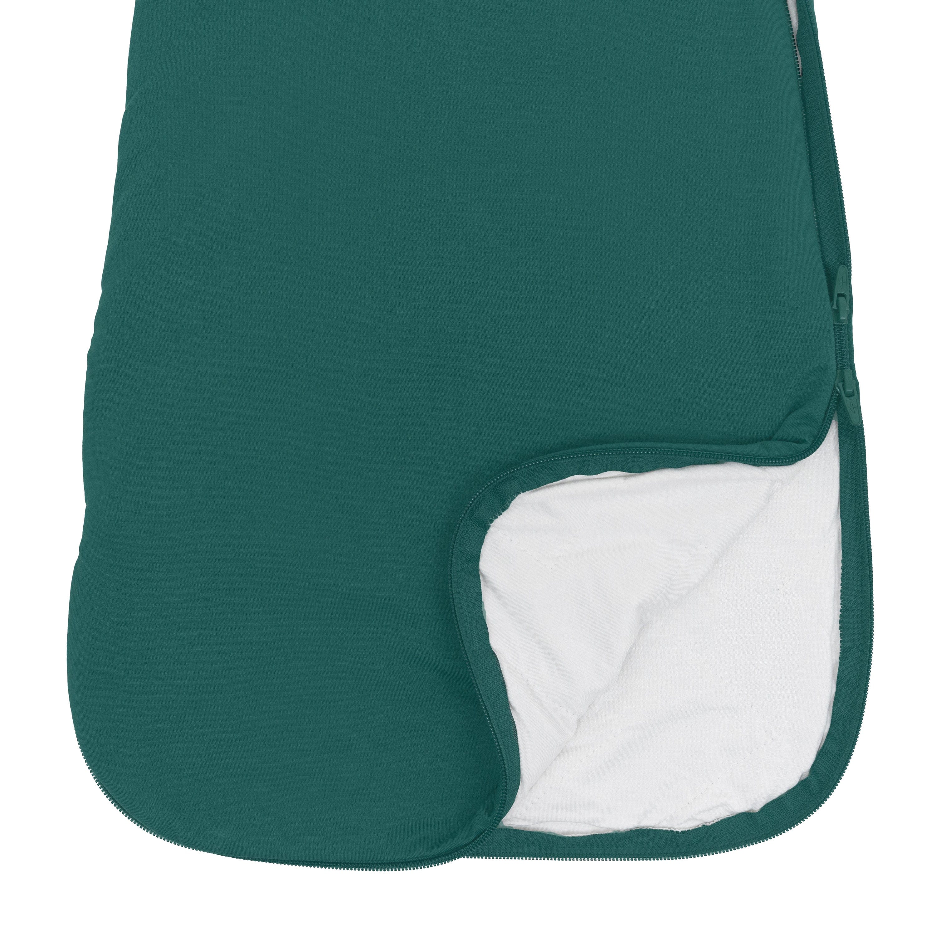 Close up of unzipped double zipper on Kyte Baby Sleep Bag in Emerald 1.0