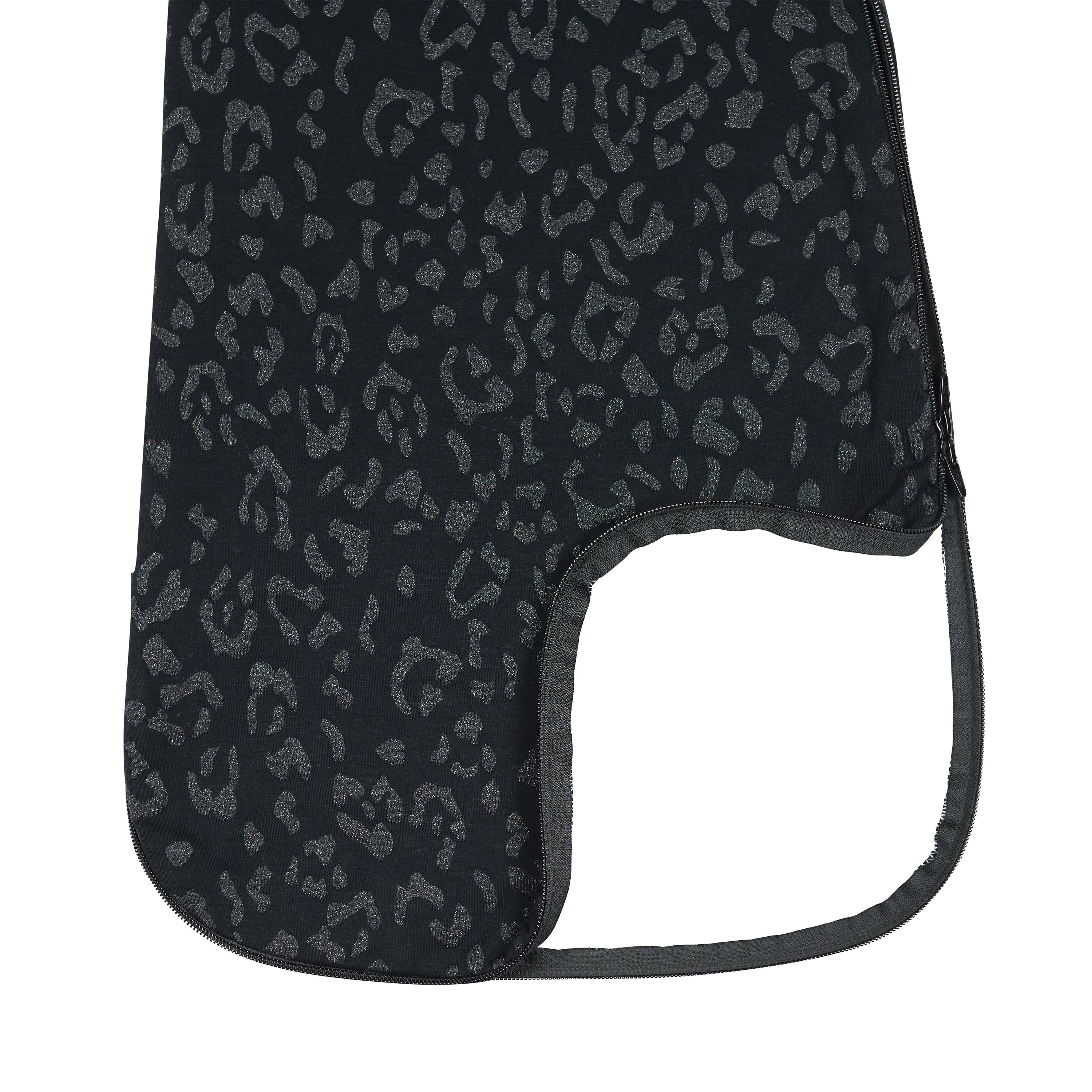 Bottom zipper open showing the dual zipper function on the Sleep Bag in Midnight Leopard 1.0