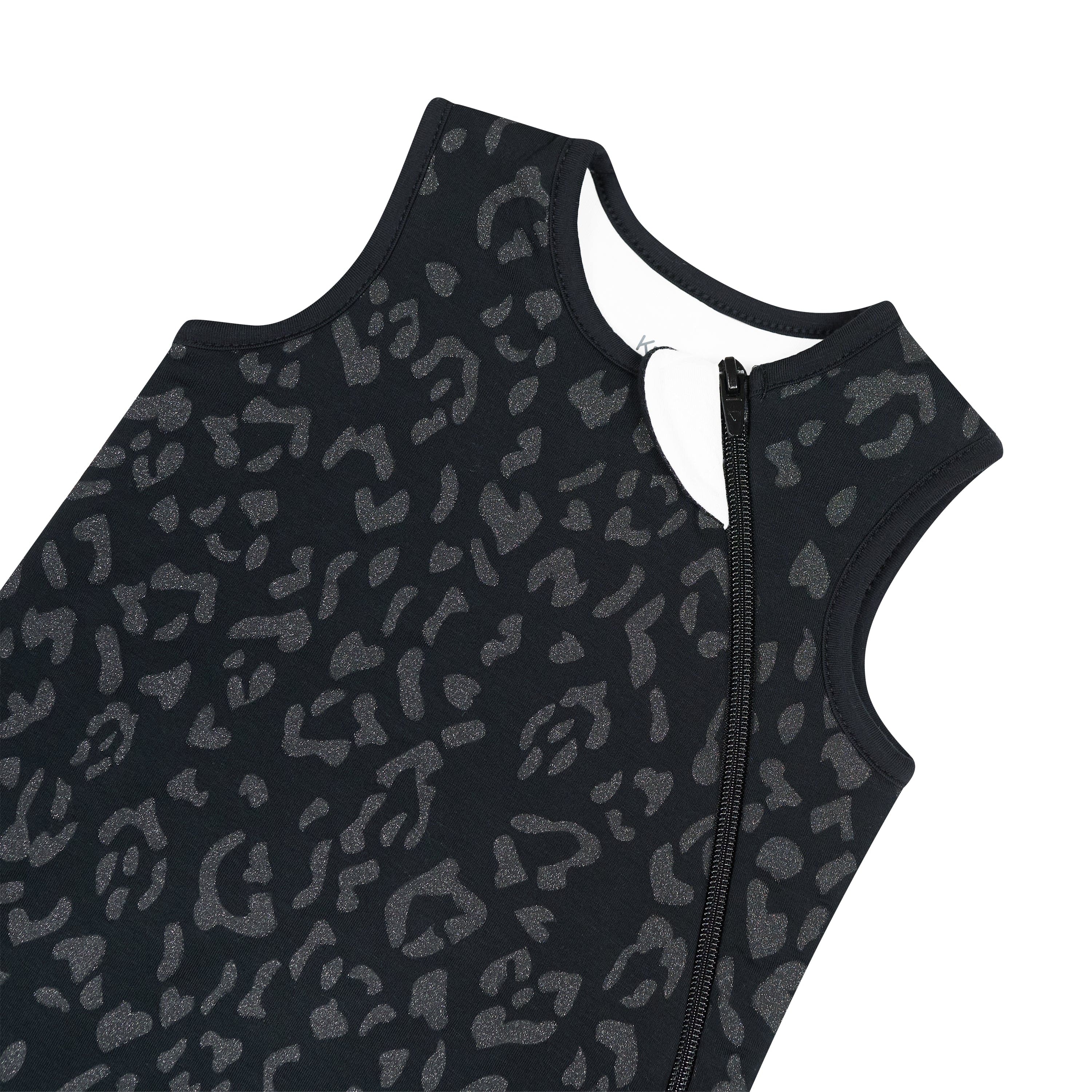 Close up of the zipper garage and top zipper on the Sleep Bag in Midnight Leopard 1.0