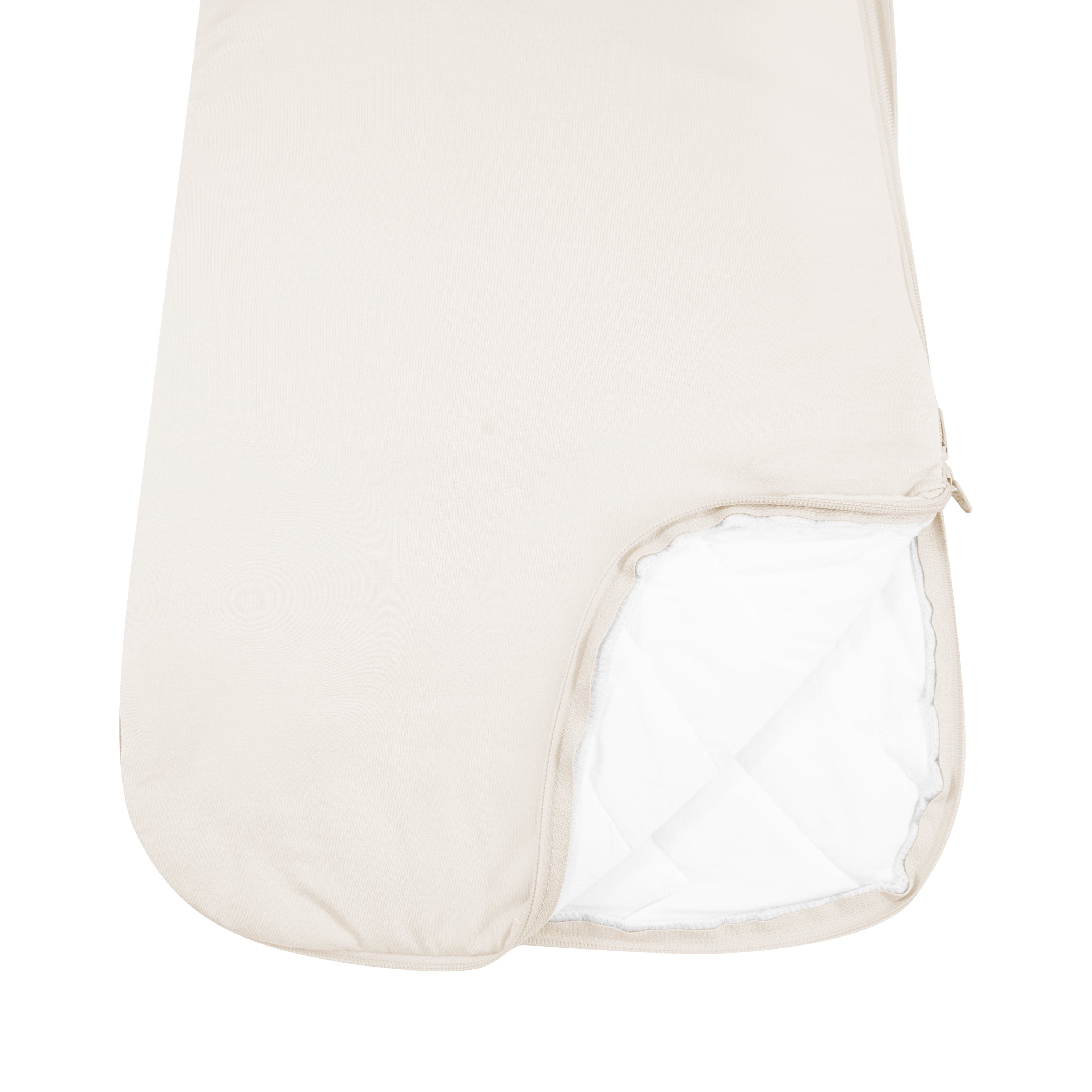 Close up of unzipped dual zipper Kyte Baby Sleep Bag in Oat 2.5