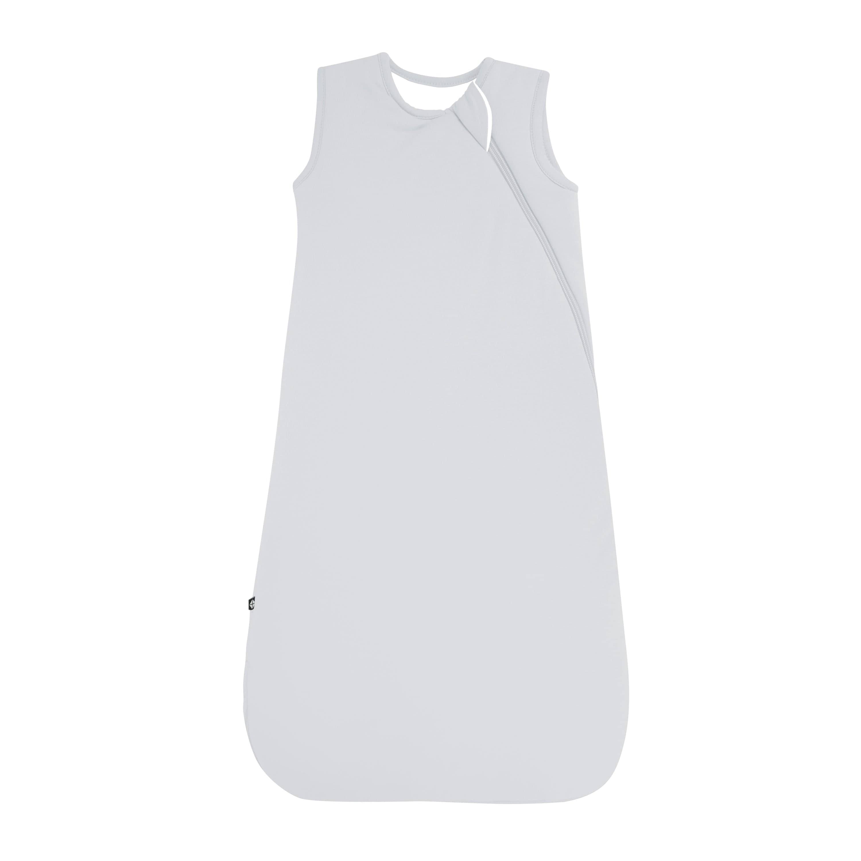 Flat lay of Kyte Baby Sleep Bag in Storm 2.5