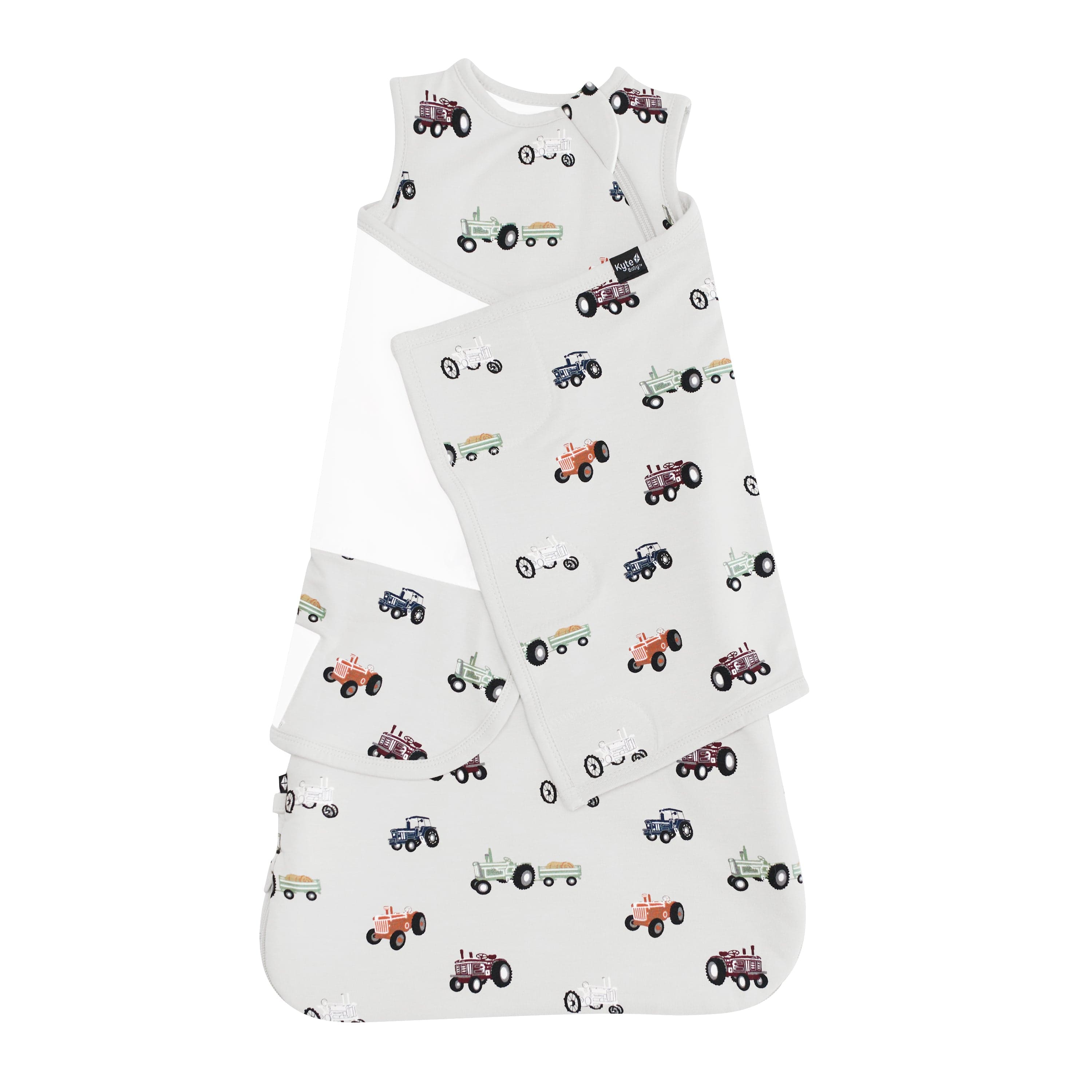 Kyte Baby Sleep Bag Swaddler in Tractor 1.0 shown swaddled