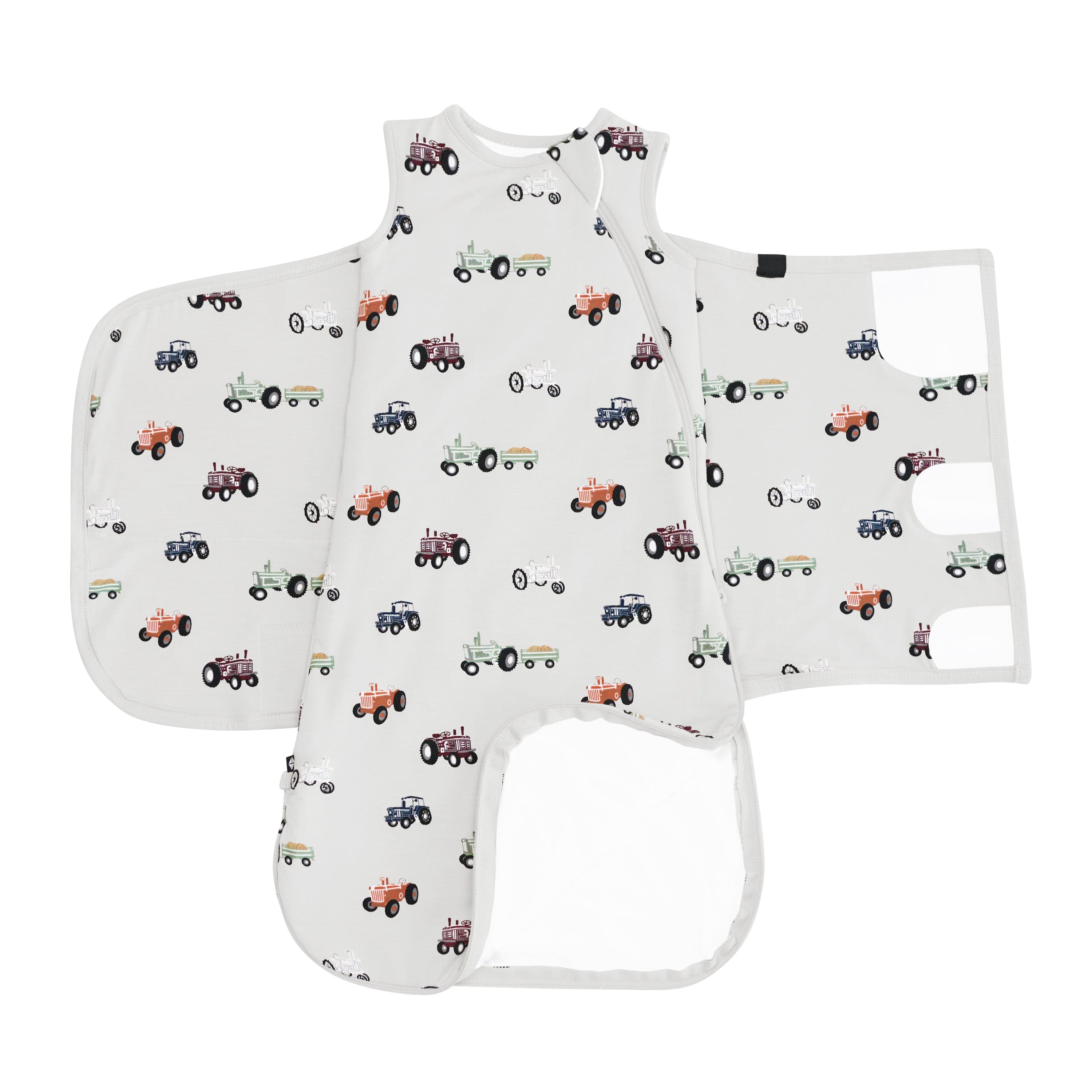 Sleep Bag Swaddler in Tractor 1.0 shown unswaddled with the bottom zipper unzippered