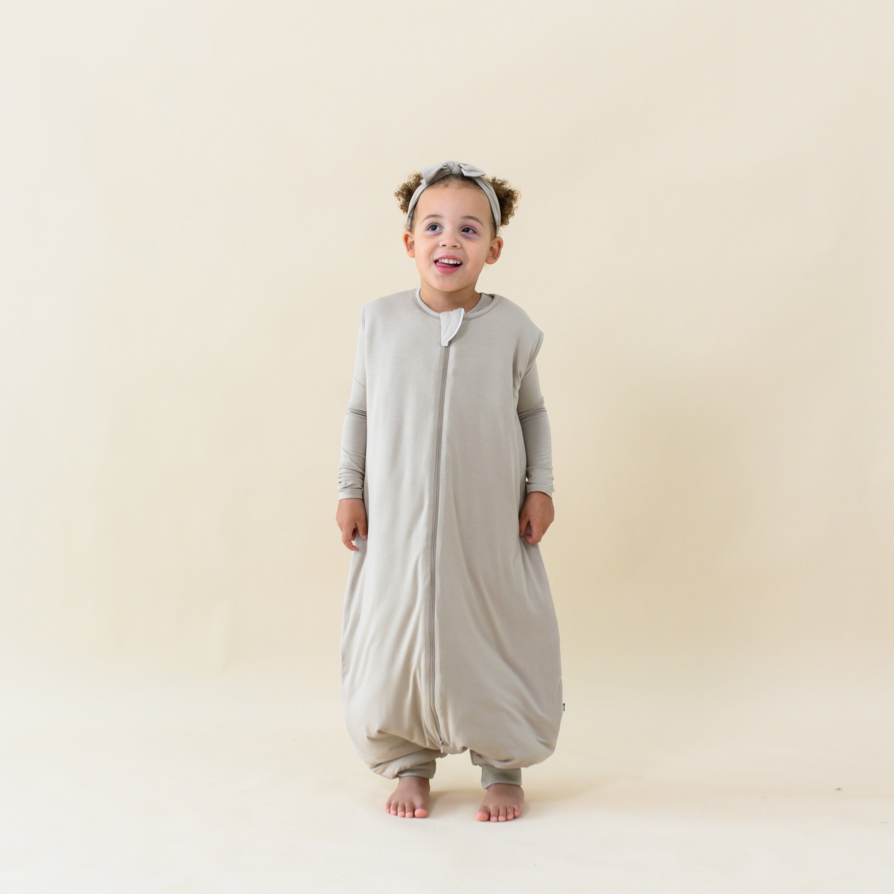 Child Wearing Bamboo Sleep Bag Walker in Almond TOG 2.5
