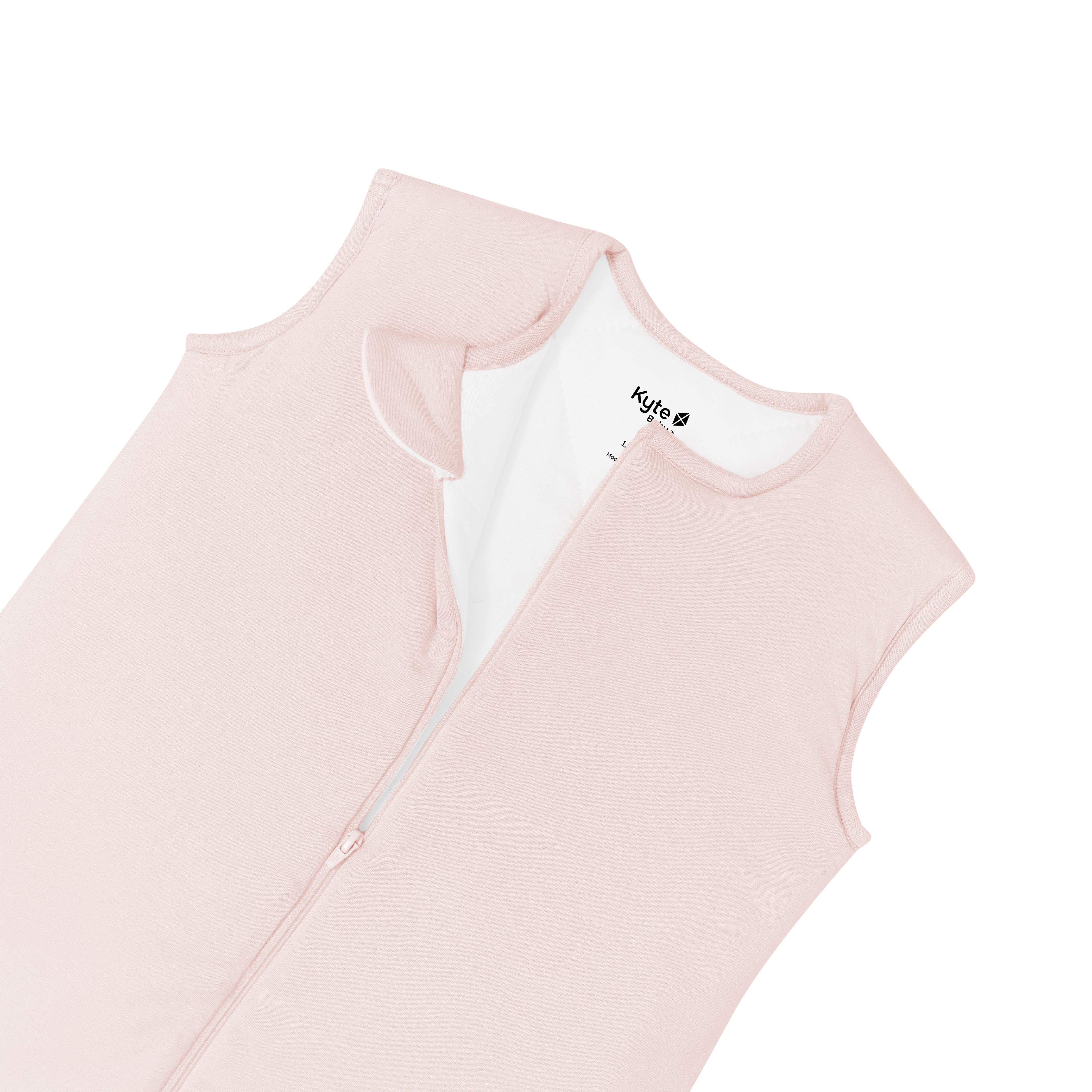 Close up of zipper garage on Kyte Baby Sleep Bag Walker in Blush 1.0