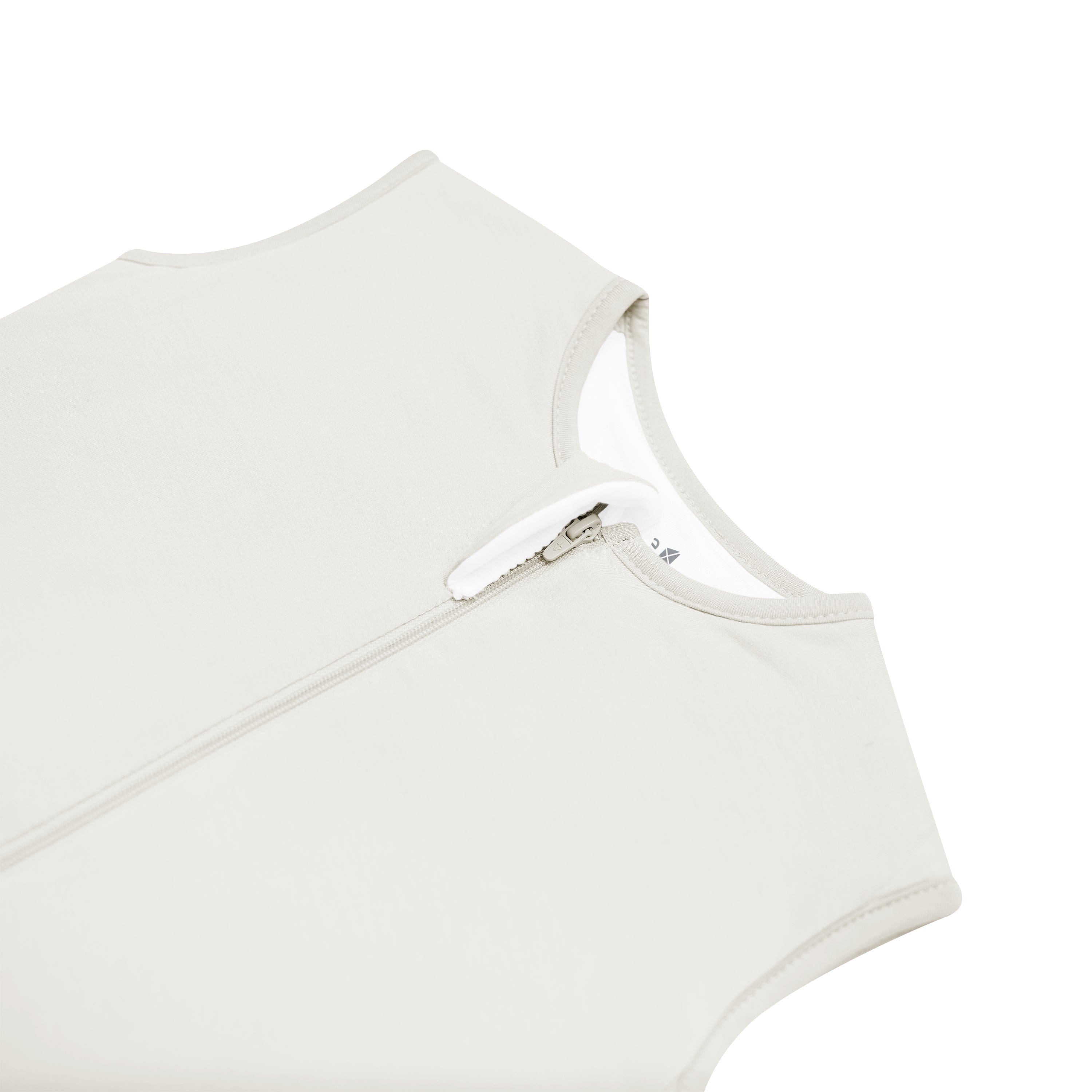 Close up of the zipper garage on the Sleep Bag Walker in Oat 1.0