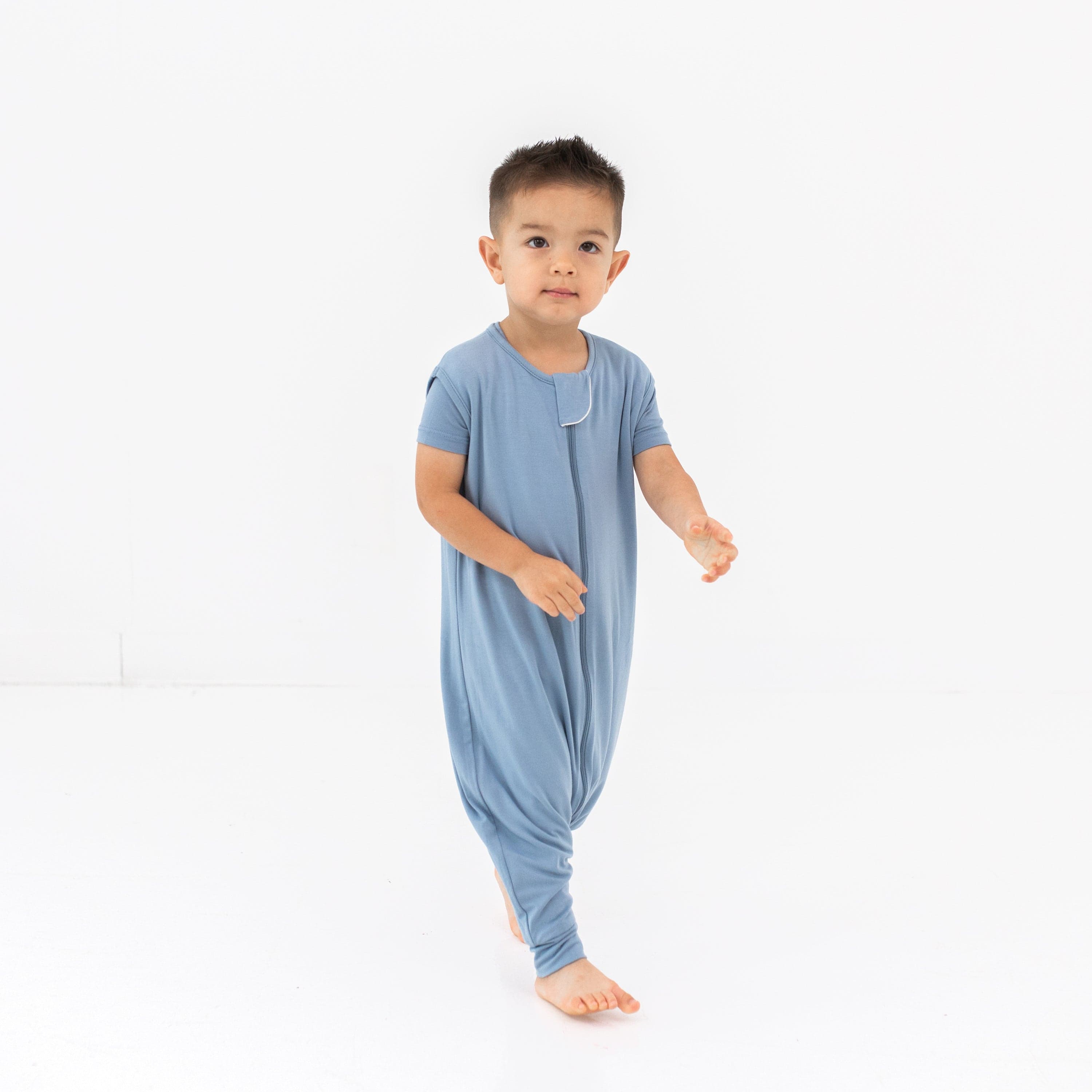 Model walking in the Sleep Bag Walker in Slate 0.5