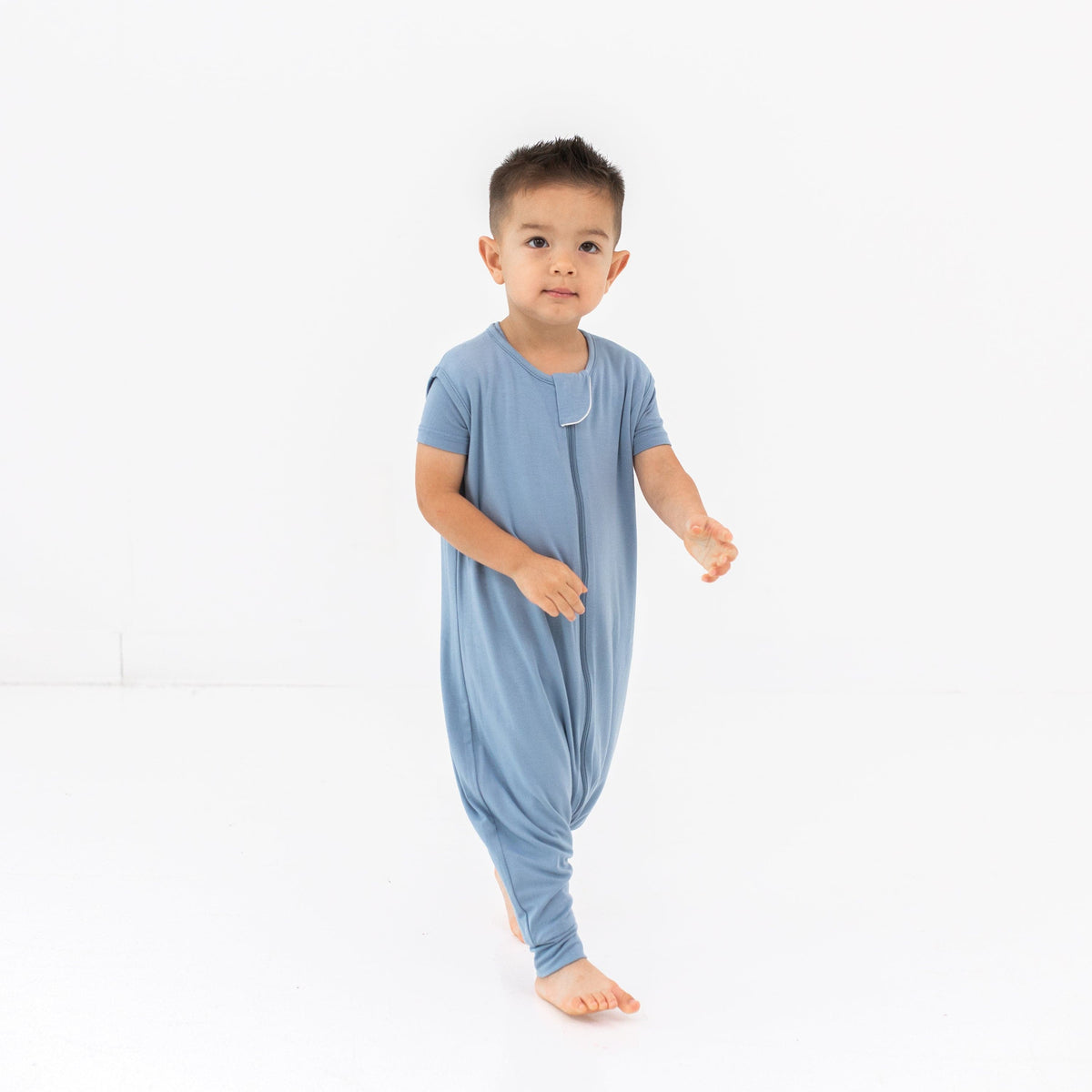 Model walking in the Sleep Bag Walker in Slate 0.5