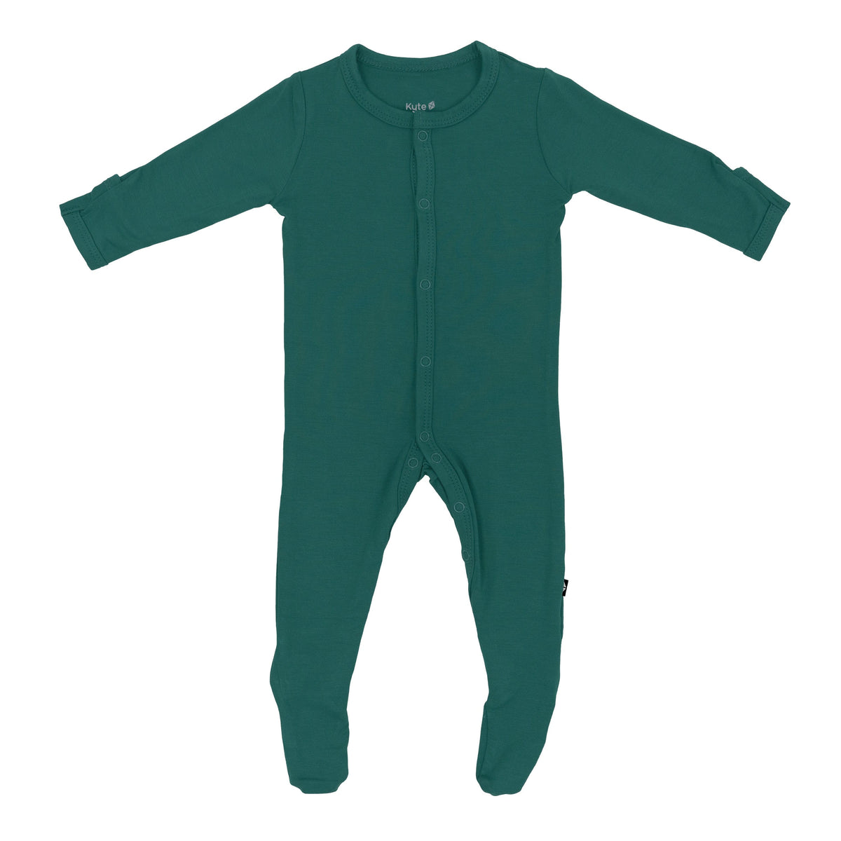 Flat lay of Kyte Baby Footie in Emerald