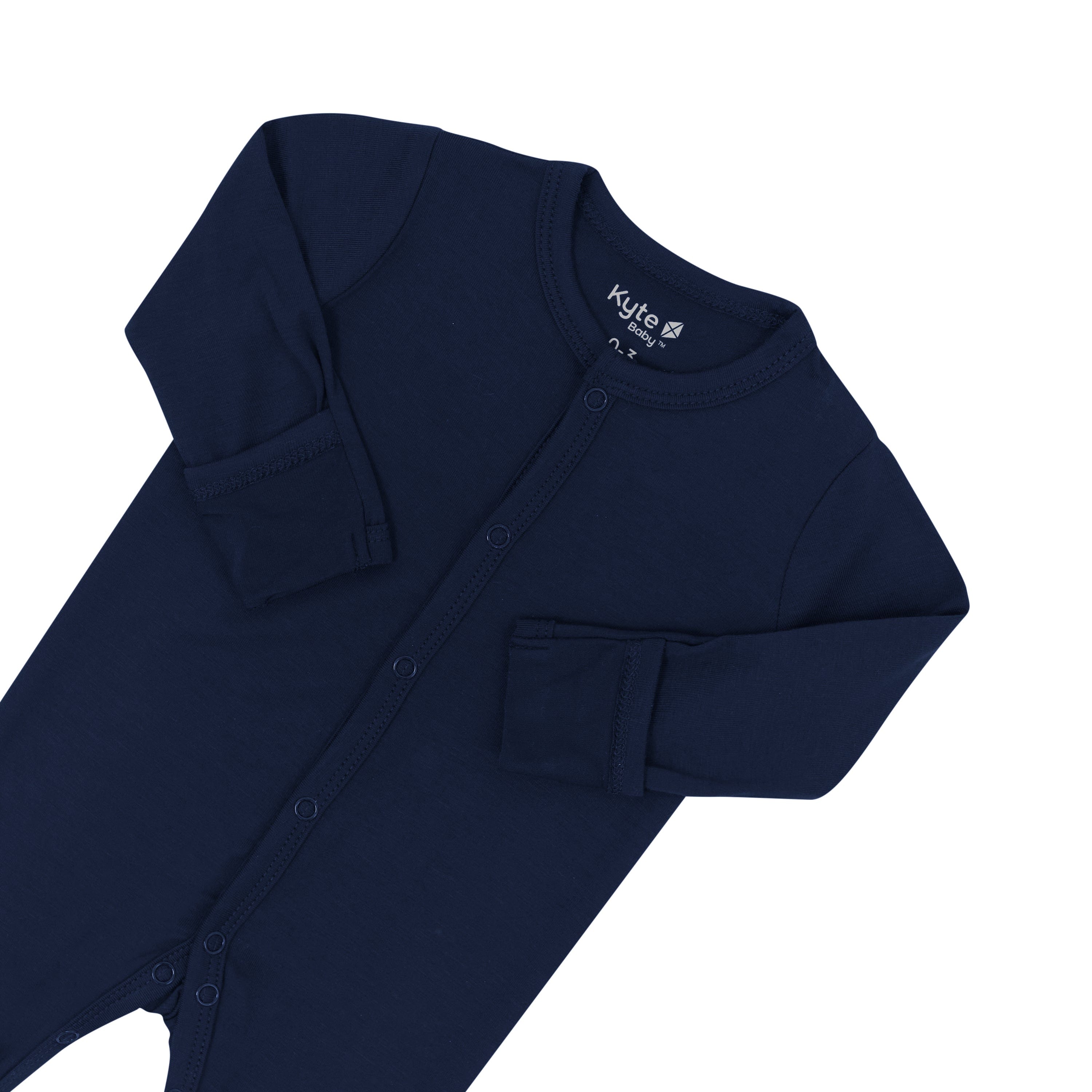 Foldover cuffs on Kyte Baby snap Footie in Navy