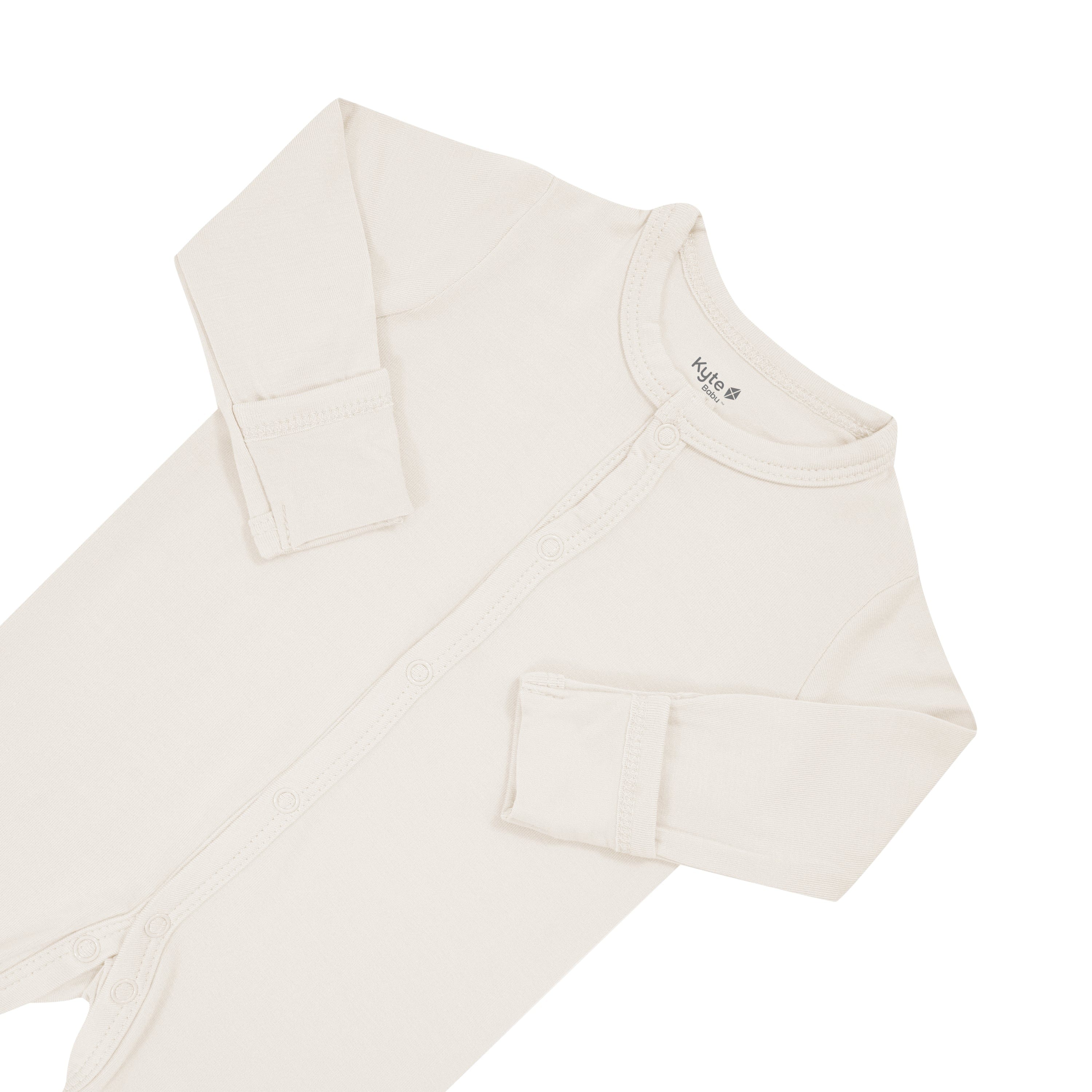 Fold over cuffs on Kyte Baby snap Footie in Oat