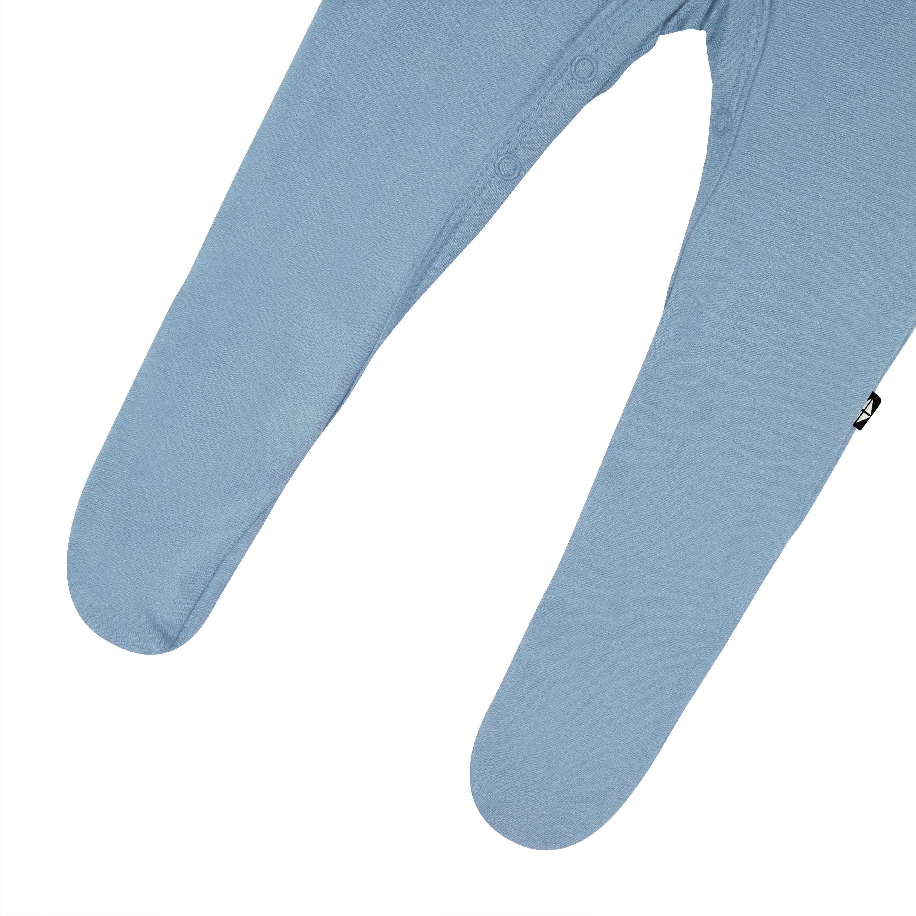 Footed legs and snaps on Kyte Baby Footie in Slate