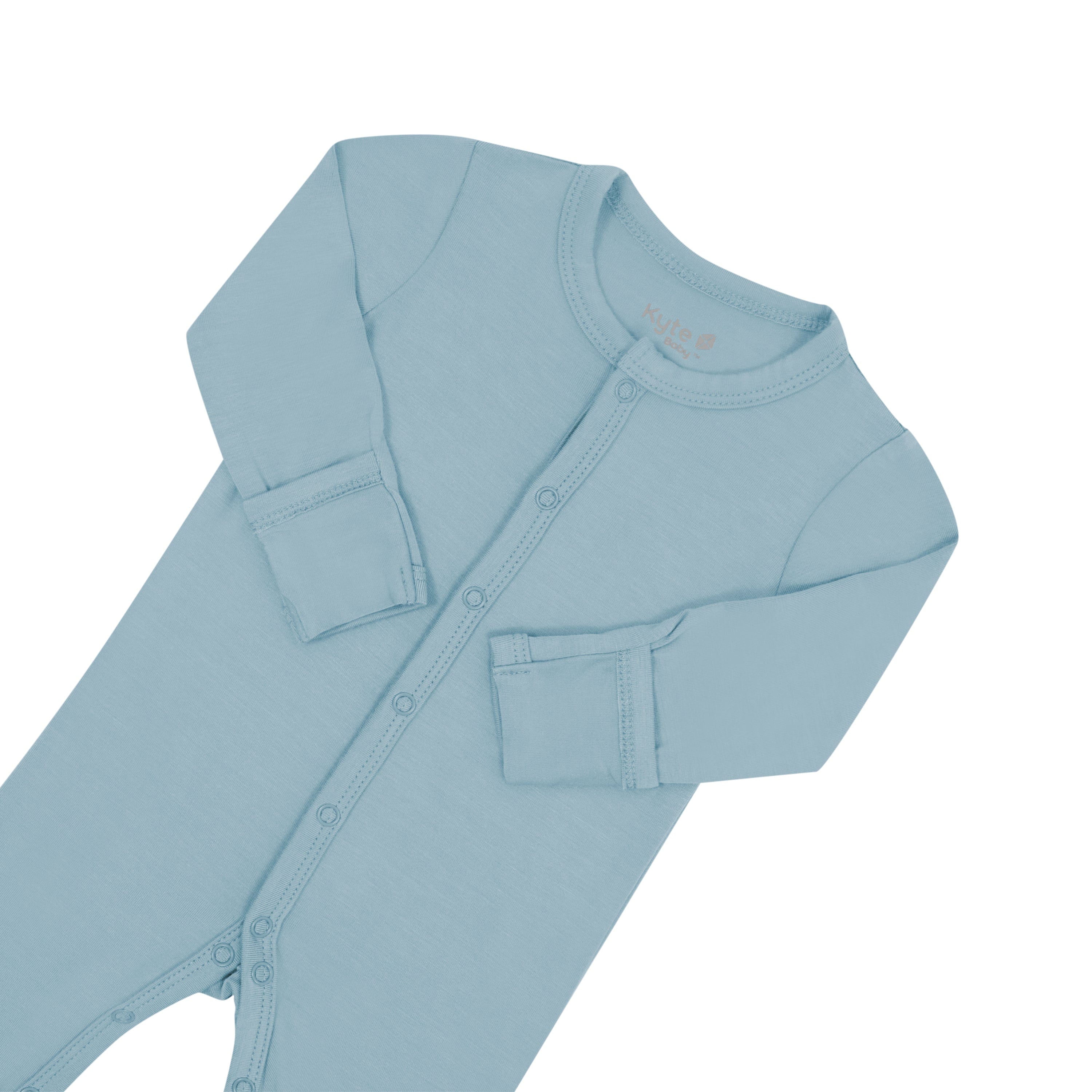 Fold-over cuffs on Kyte Baby Romper in Dusty Blue