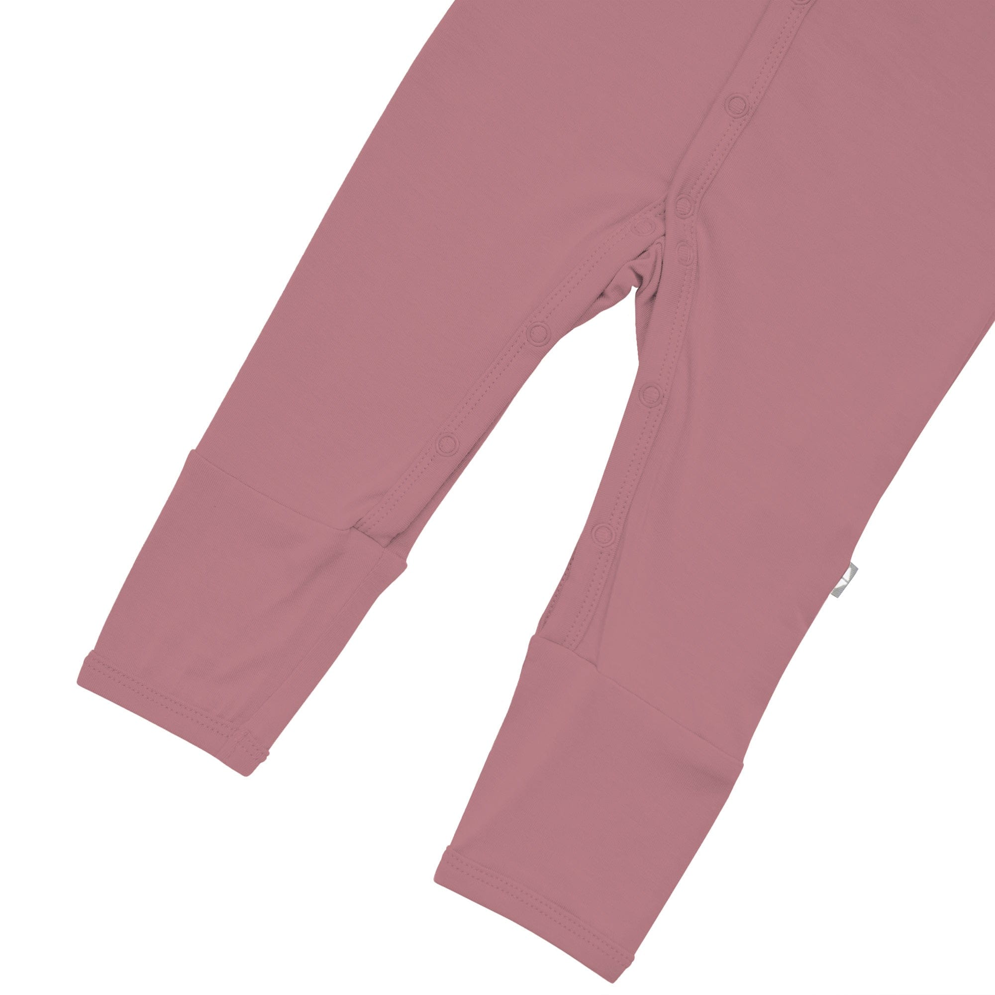 Open feet on Kyte Baby Romper in Dusty Rose