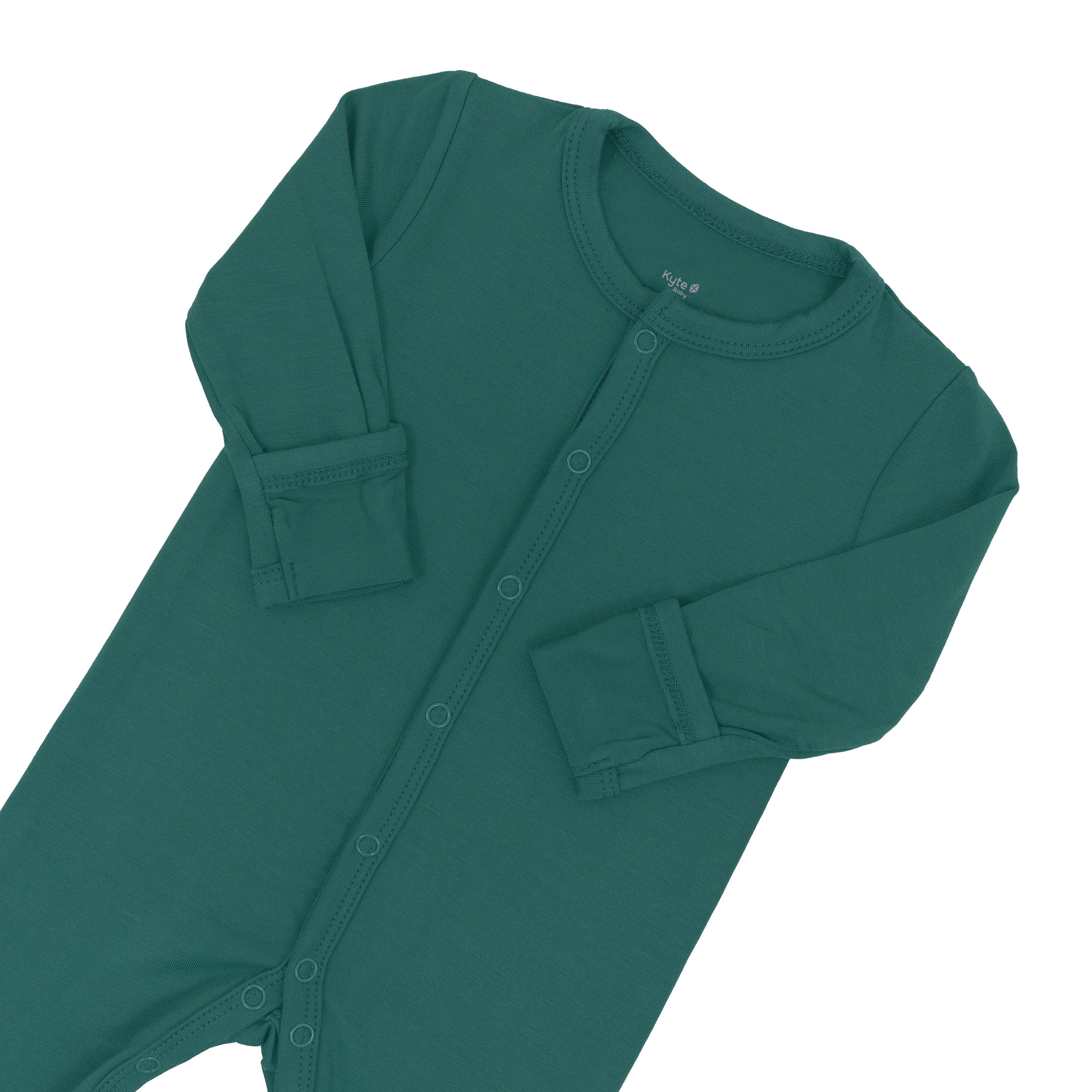 Close up of top portion of Kyte Baby Romper in Emerald