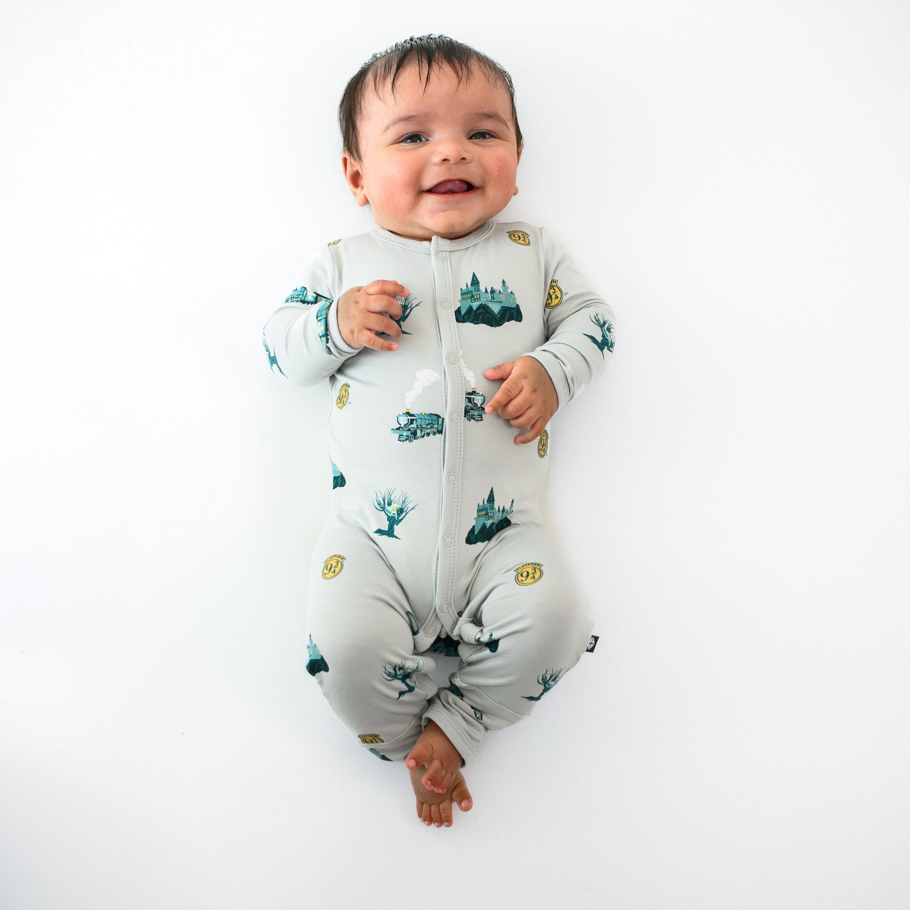 Infant wearing Kyte Baby Romper in Journey