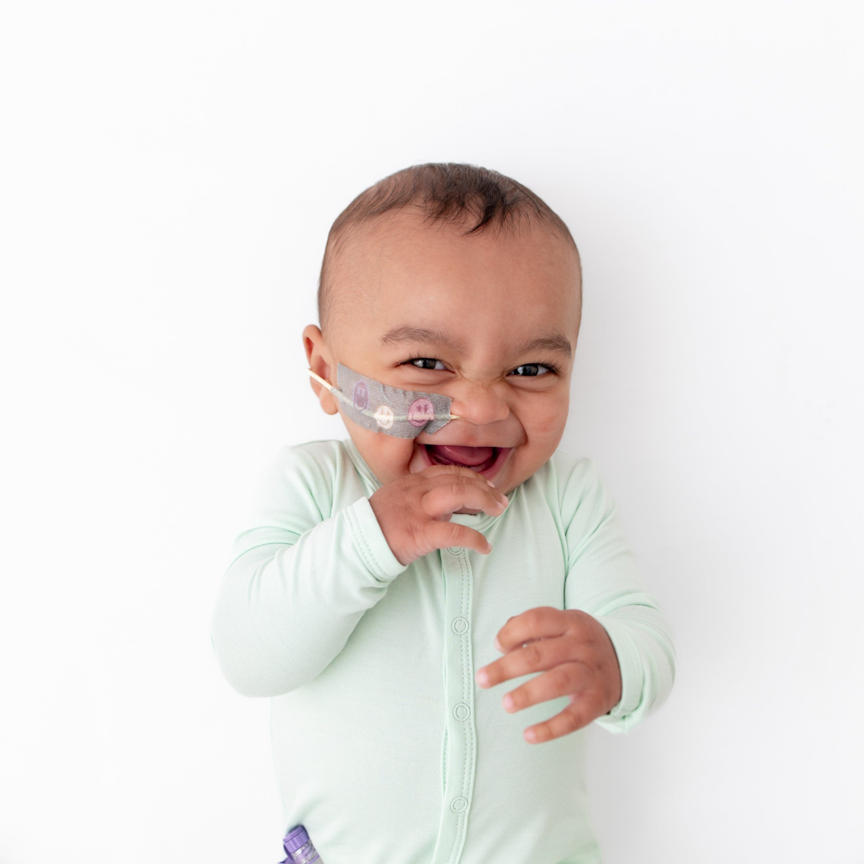 Kyte Baby Snap Romper Romper in Mint